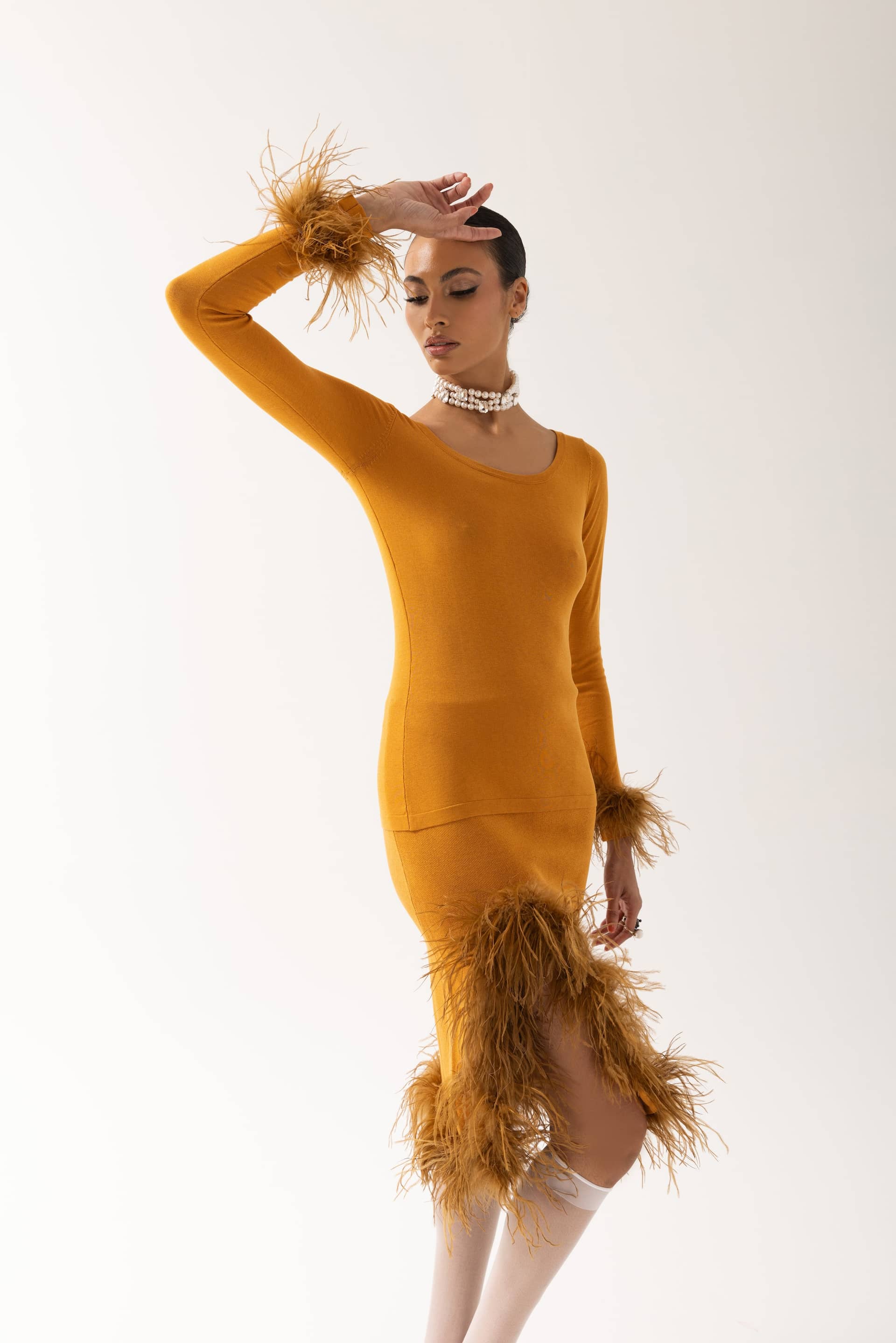 Camel Knit Top With Detachable Feather Cuffs made by ANDREEVA