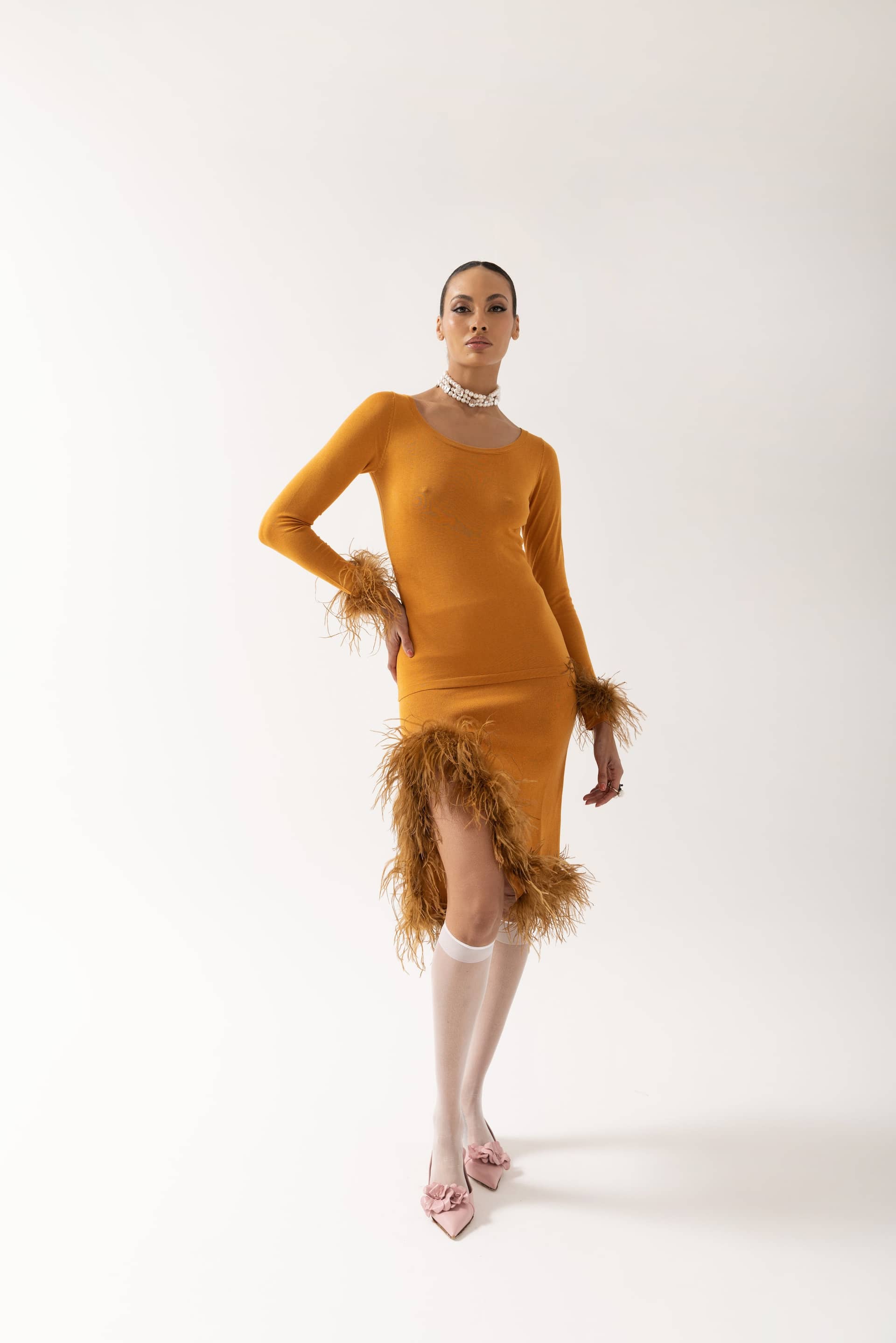 Camel Knit Top With Detachable Feather Cuffs made by ANDREEVA