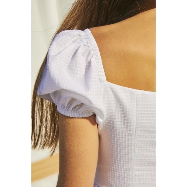 Movenna Top in White made by Nazli Ceren