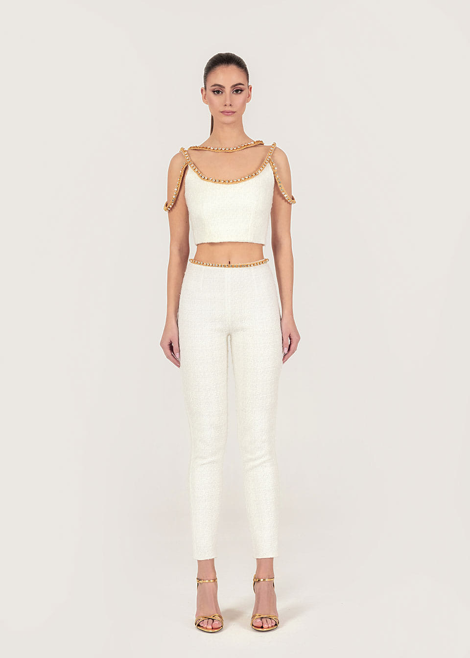 Gold thread-embroidered tweed pants made by Monika Dimova