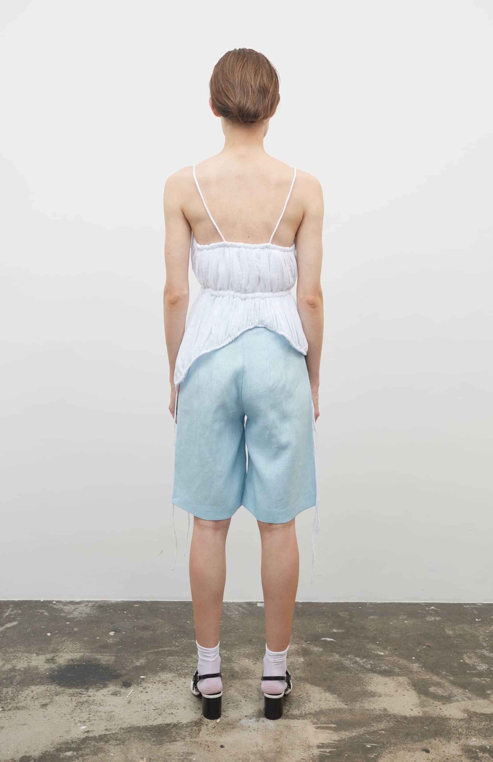 Knee-length H-line shorts made by Tamar Keburia