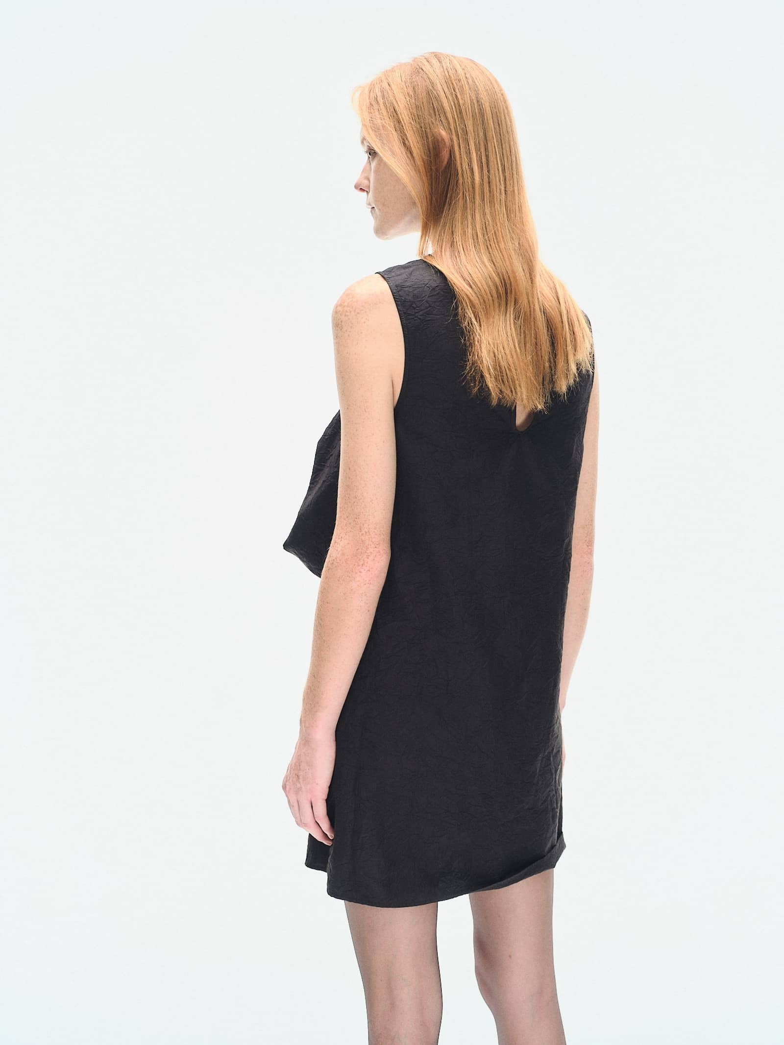 BLACK TEXTURED DRAPED MINI DRESS made by YIBRI