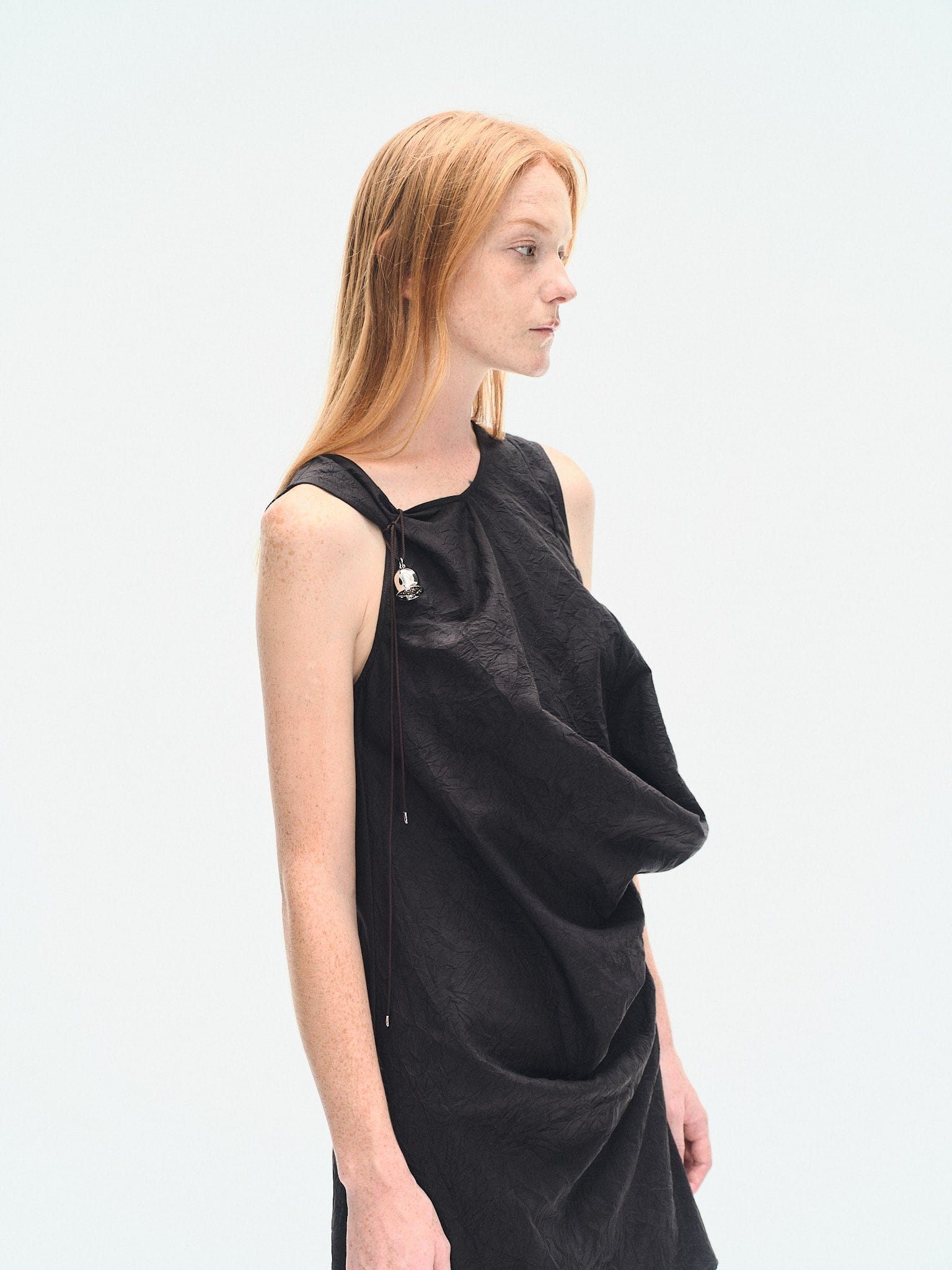 BLACK TEXTURED DRAPED MINI DRESS made by YIBRI