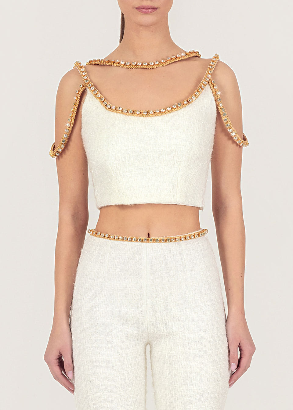 Gold thread-embroidered tweed top made by Monika Dimova