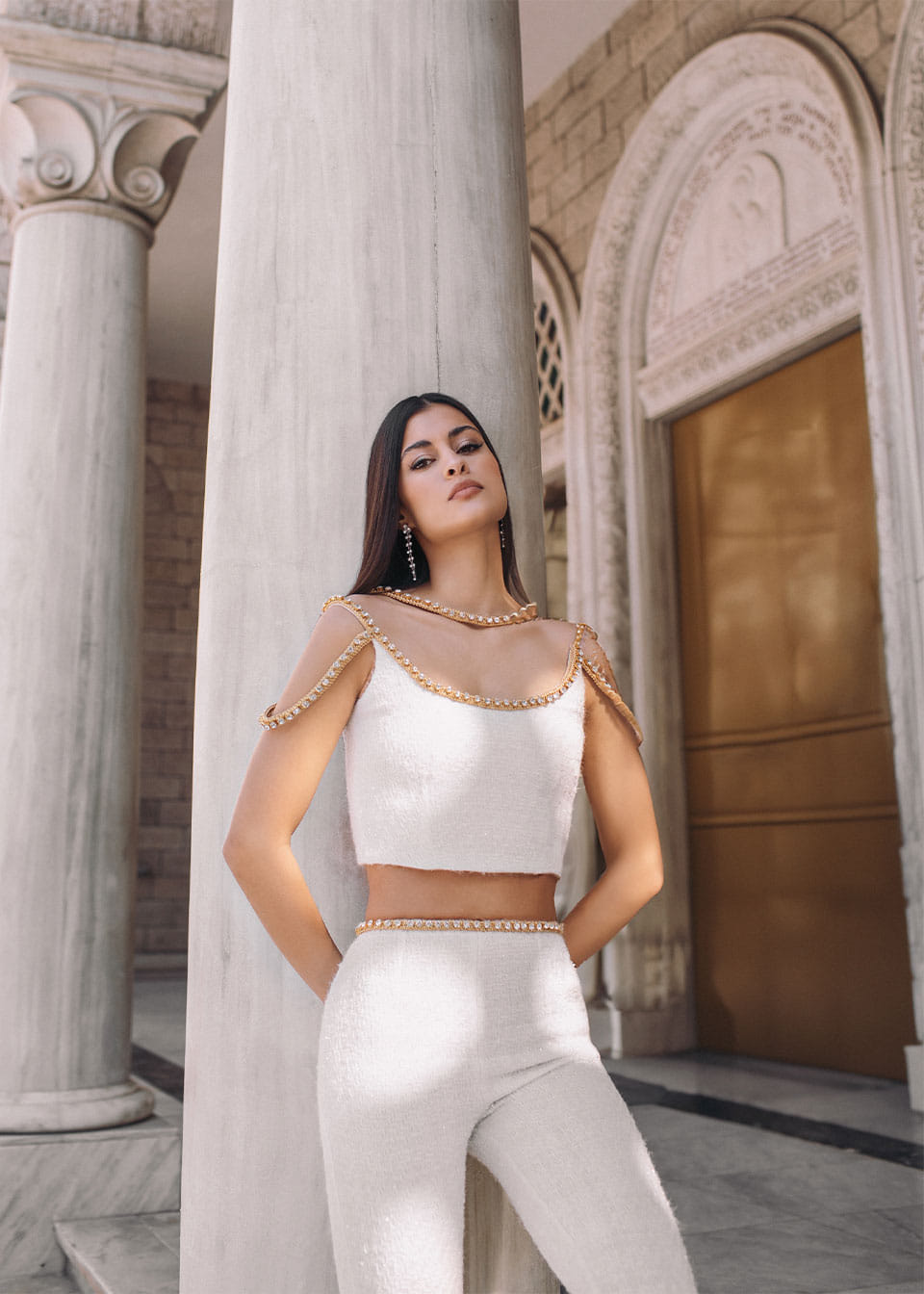 Gold thread-embroidered tweed top made by Monika Dimova