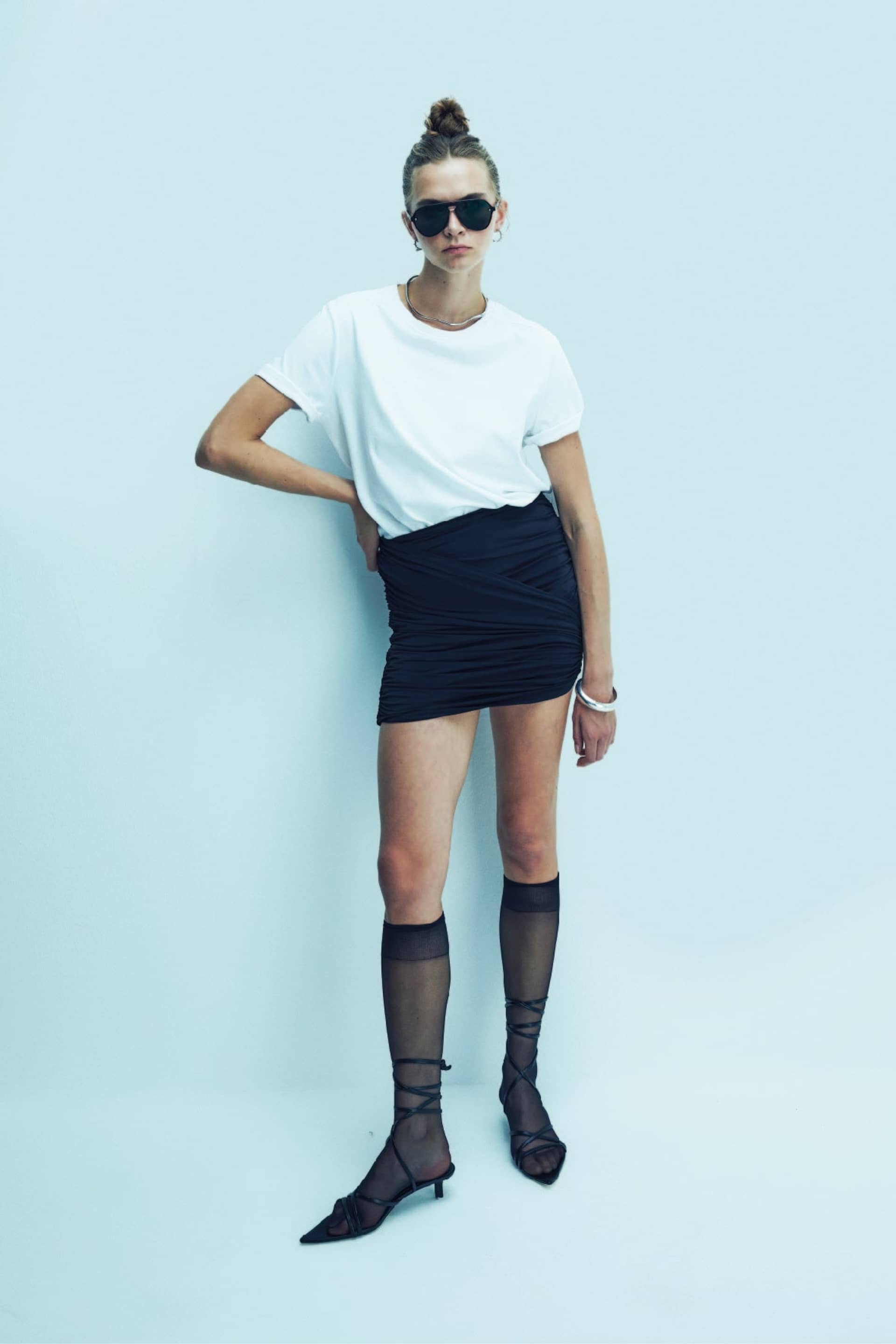 Micha Jersey Asymmetric Mini Skirt in Black made by Nazli Ceren
