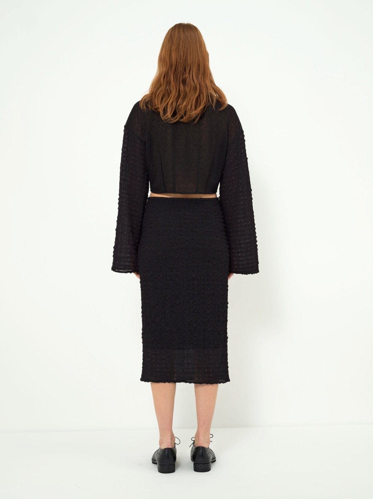 TEXTURED MIDI SKIRT made by YIBRI