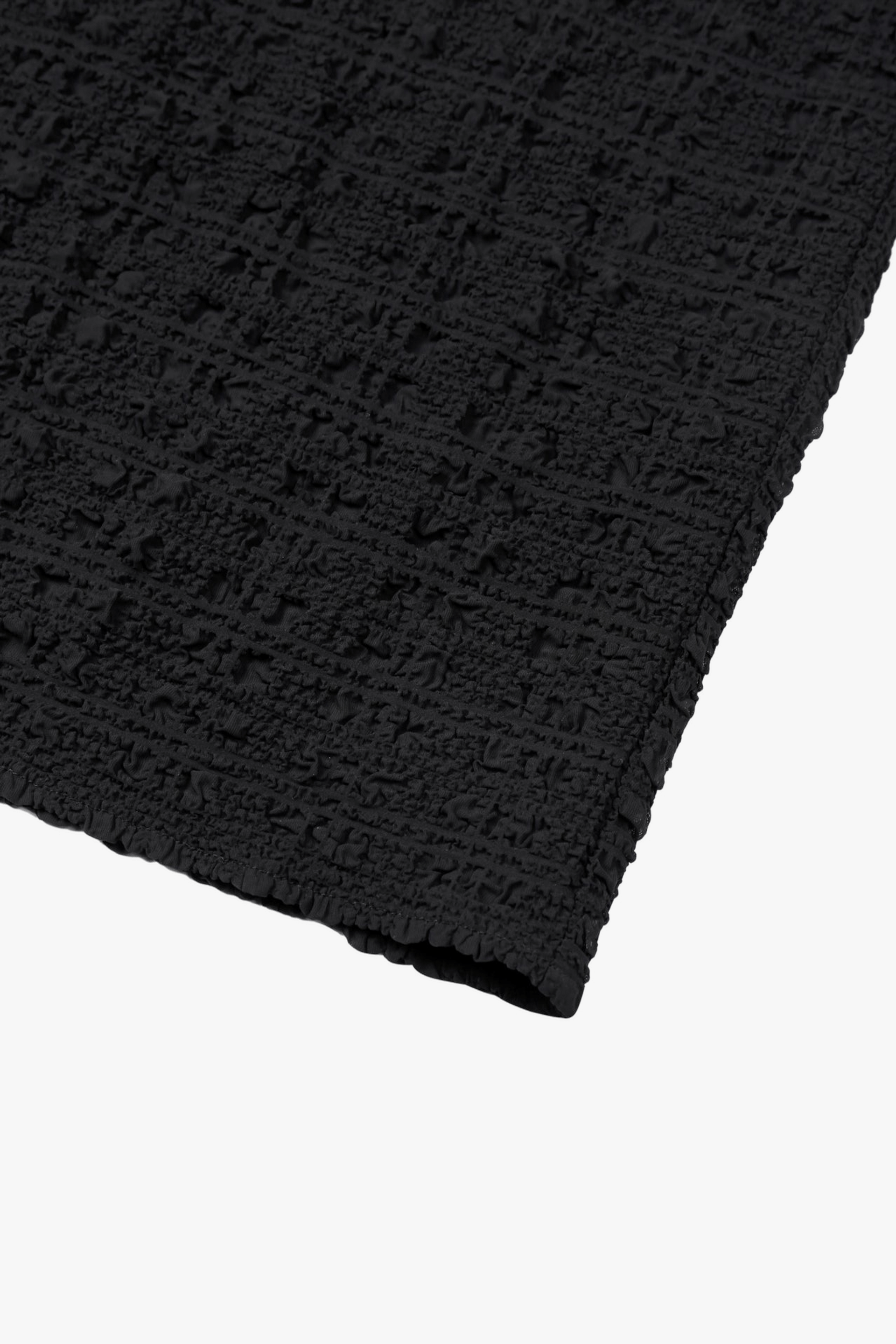 TEXTURED MIDI SKIRT made by YIBRI