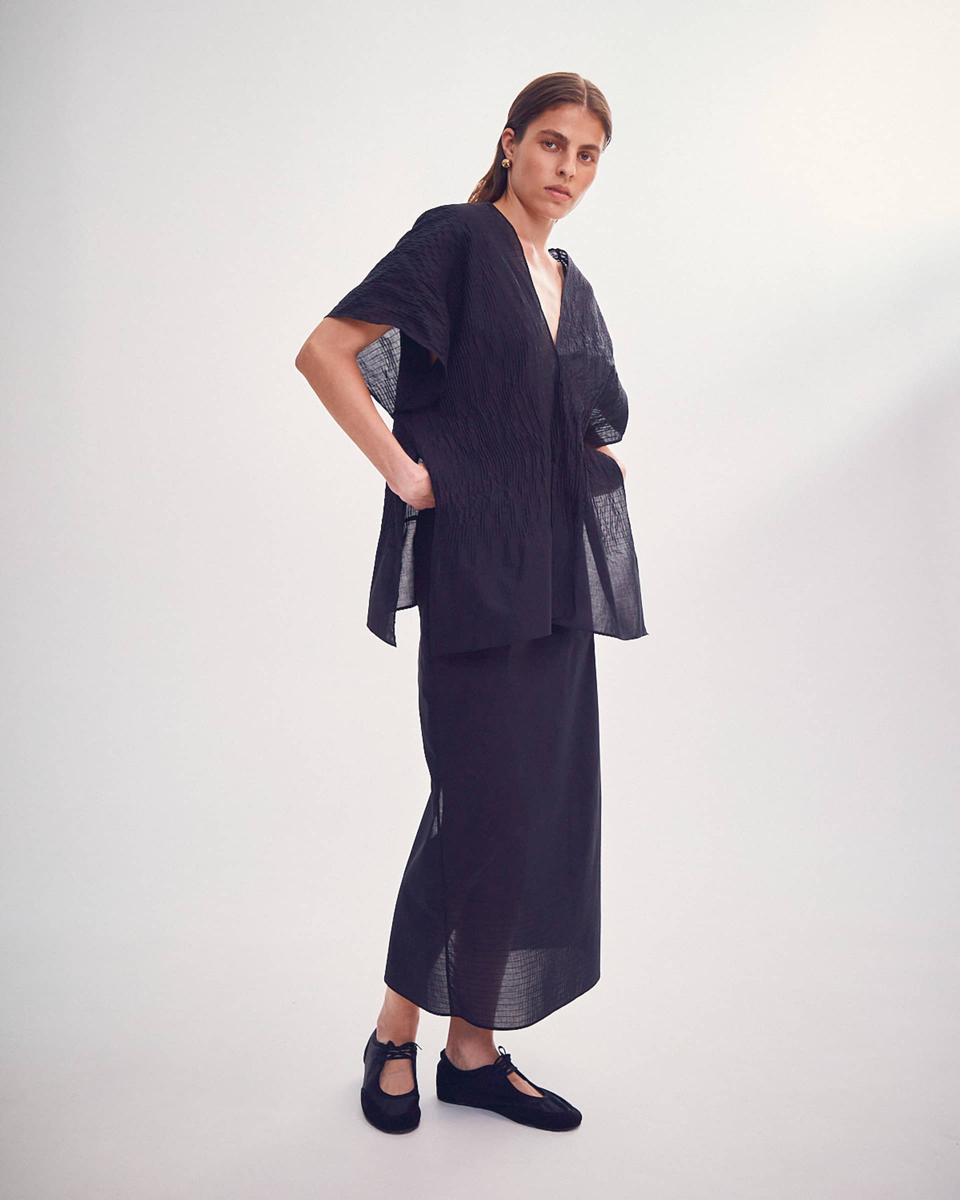 SKIRT WITH A TIED BELT made by DELEGAN Clothes