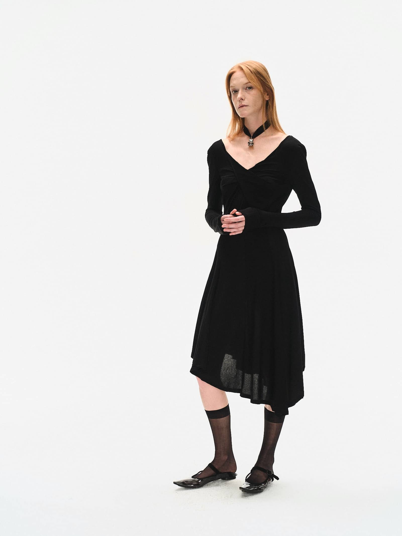 LONG SLEEVE FITTED KNIT DRESS WITH TWISTED DETAILS made by YIBRI