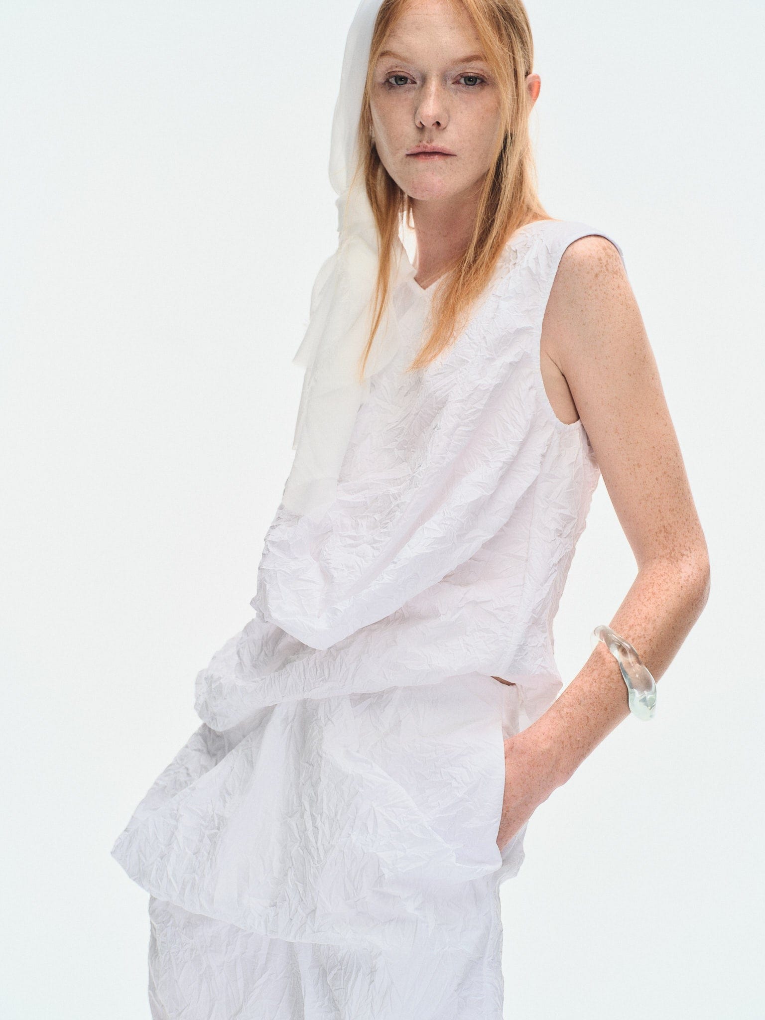 WHITE CRINKLED TEXTURE POLYESTER SLEEVELESS TOP made by YIBRI