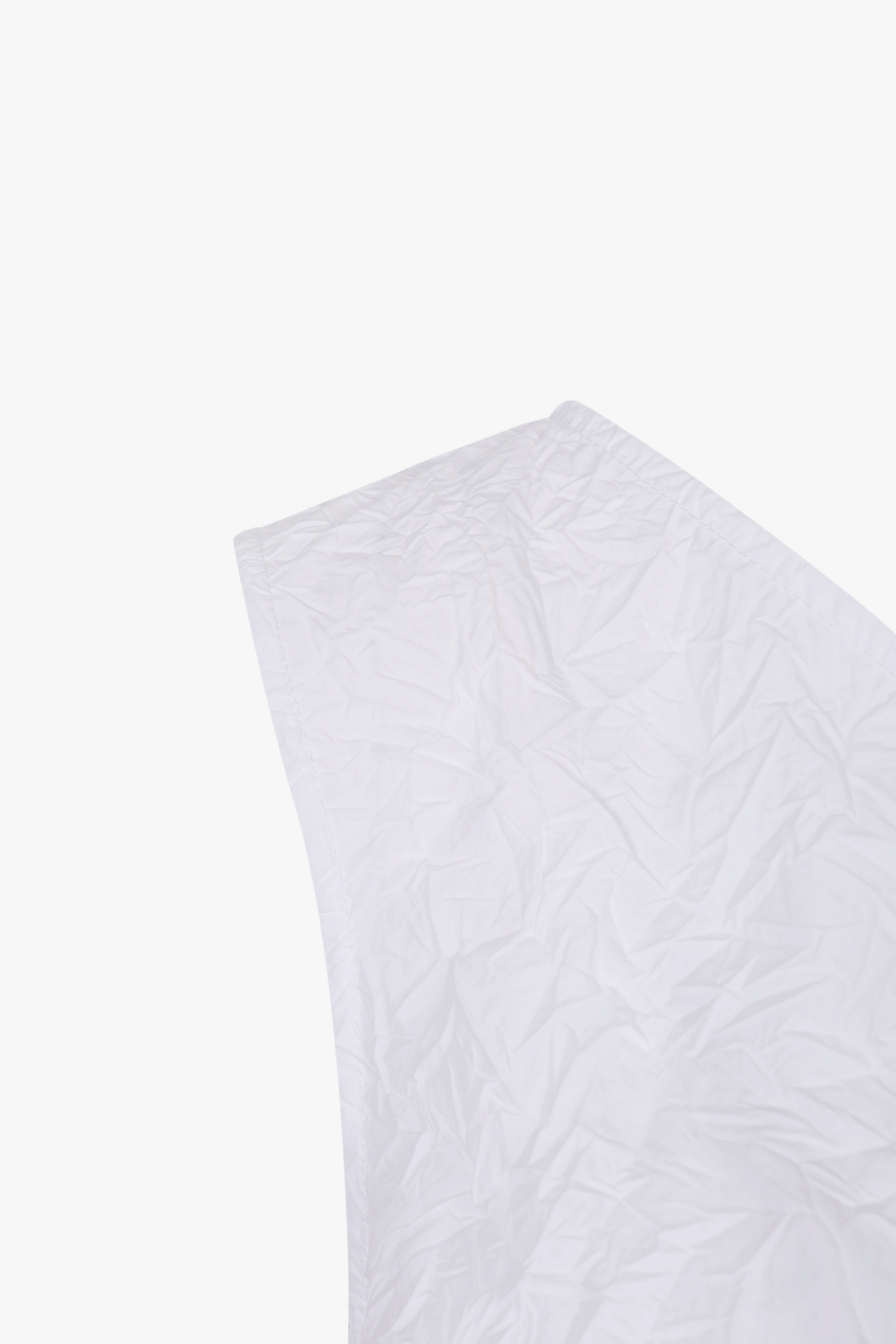 WHITE CRINKLED TEXTURE POLYESTER SLEEVELESS TOP made by YIBRI