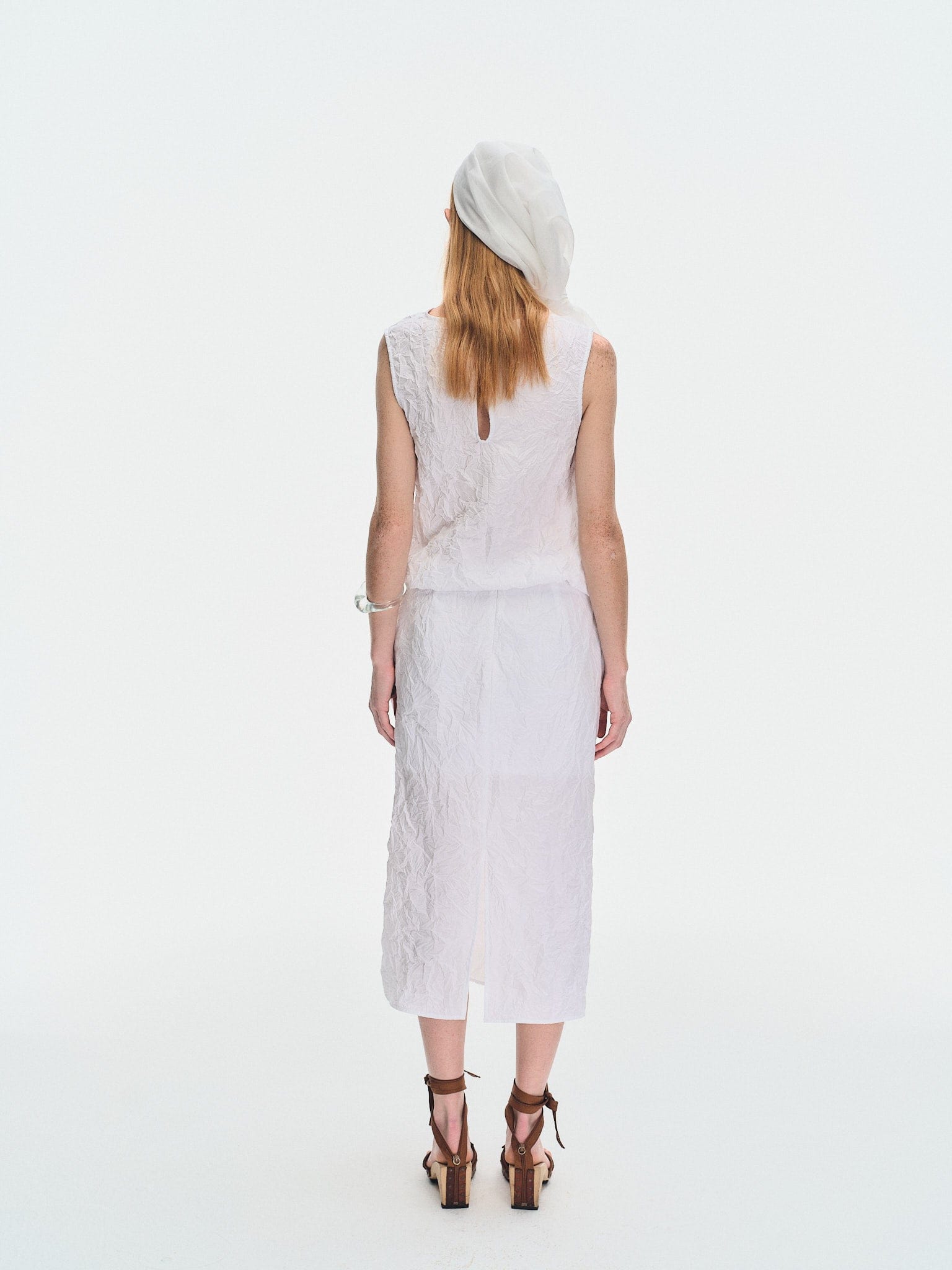 WHITE CRINKLED TEXTURE POLYESTER SLEEVELESS TOP made by YIBRI