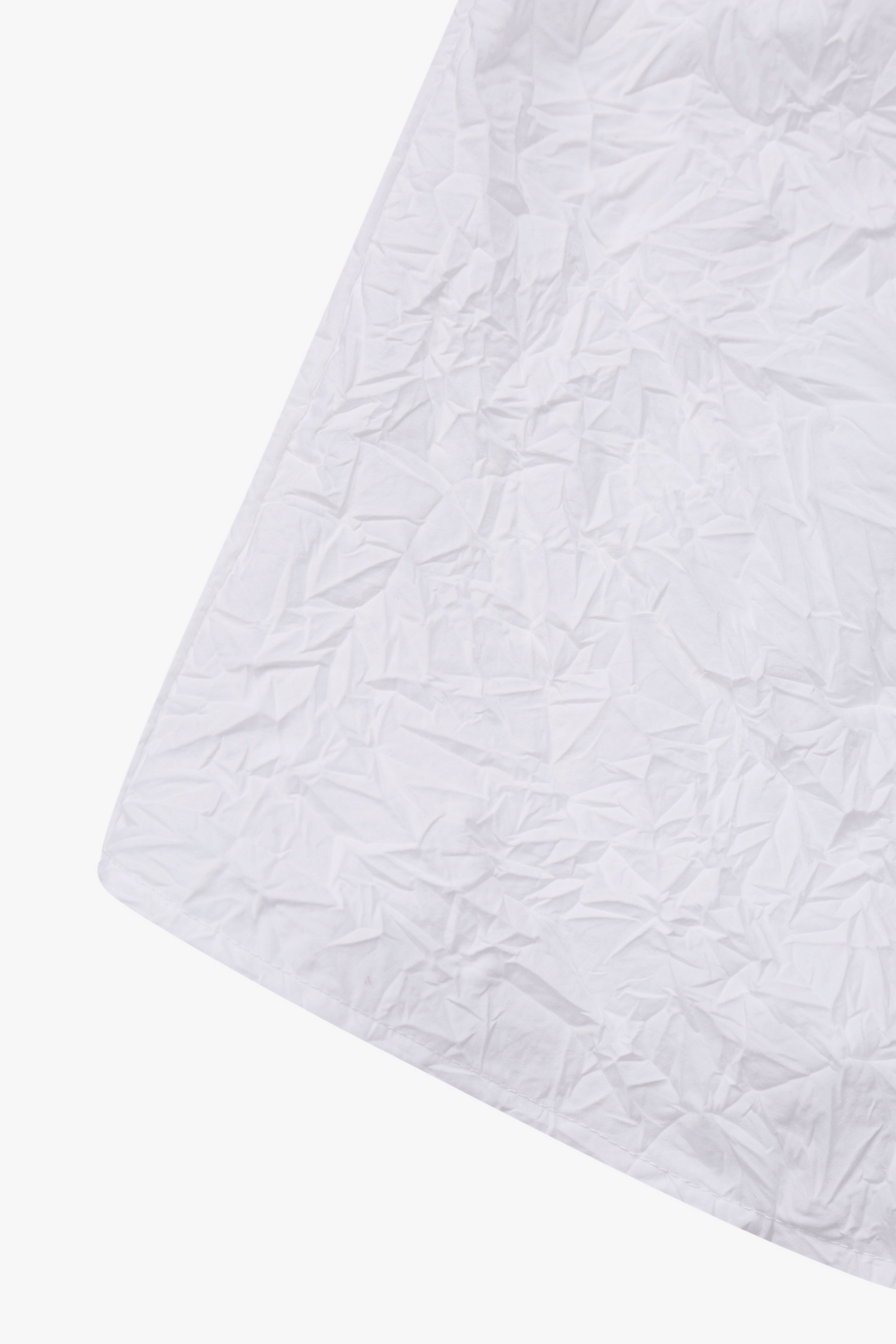 WHITE CRINKLED TEXTURE POLYESTER SLEEVELESS TOP made by YIBRI