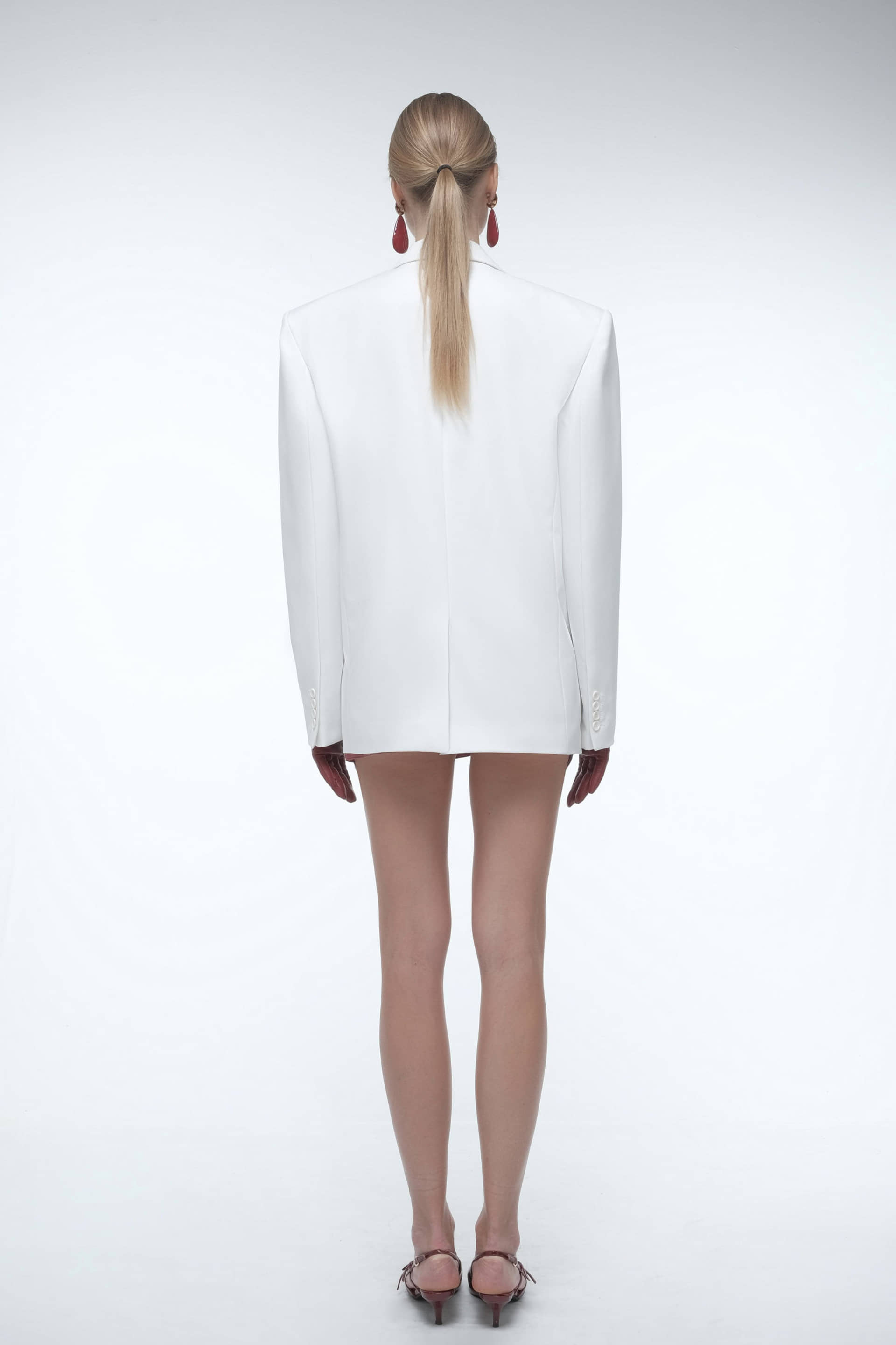 Oversized minimal blazer in White made by AFTERHOURS