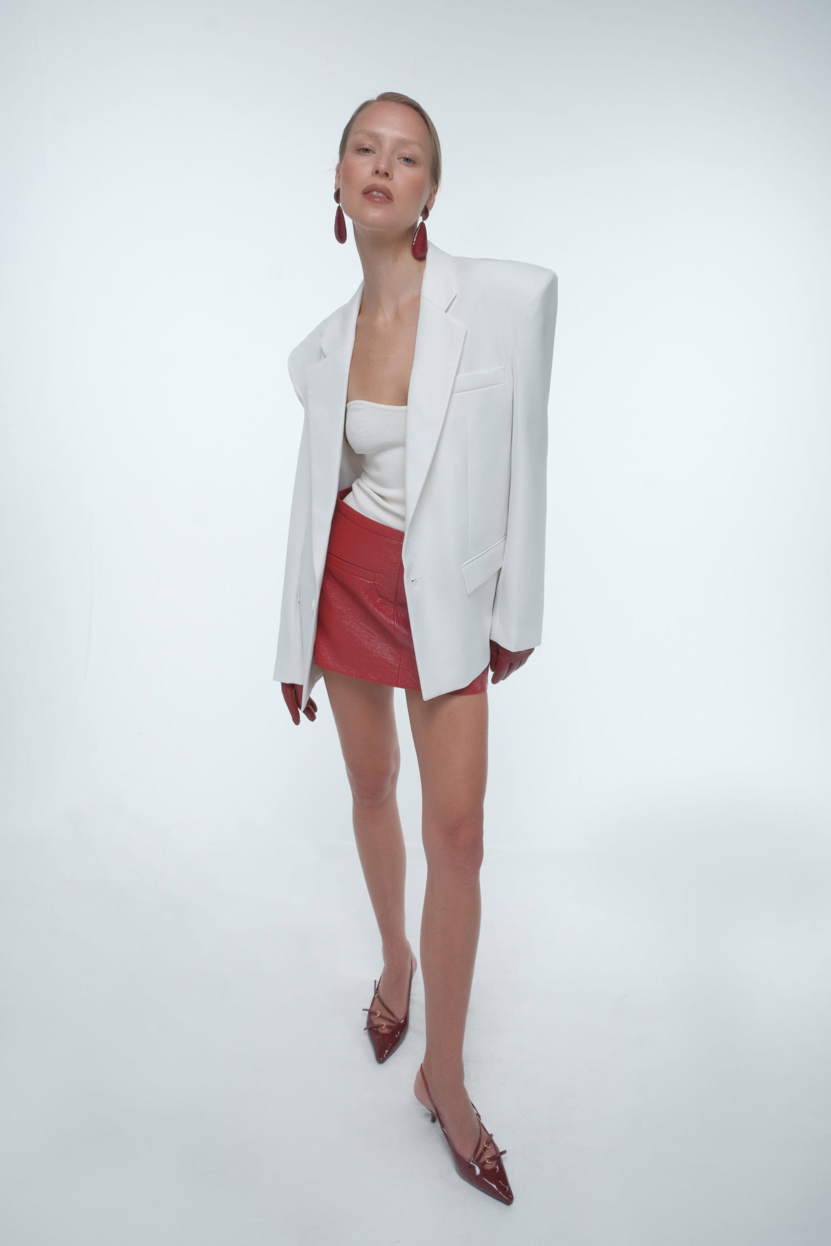 Oversized minimal blazer in White made by AFTERHOURS