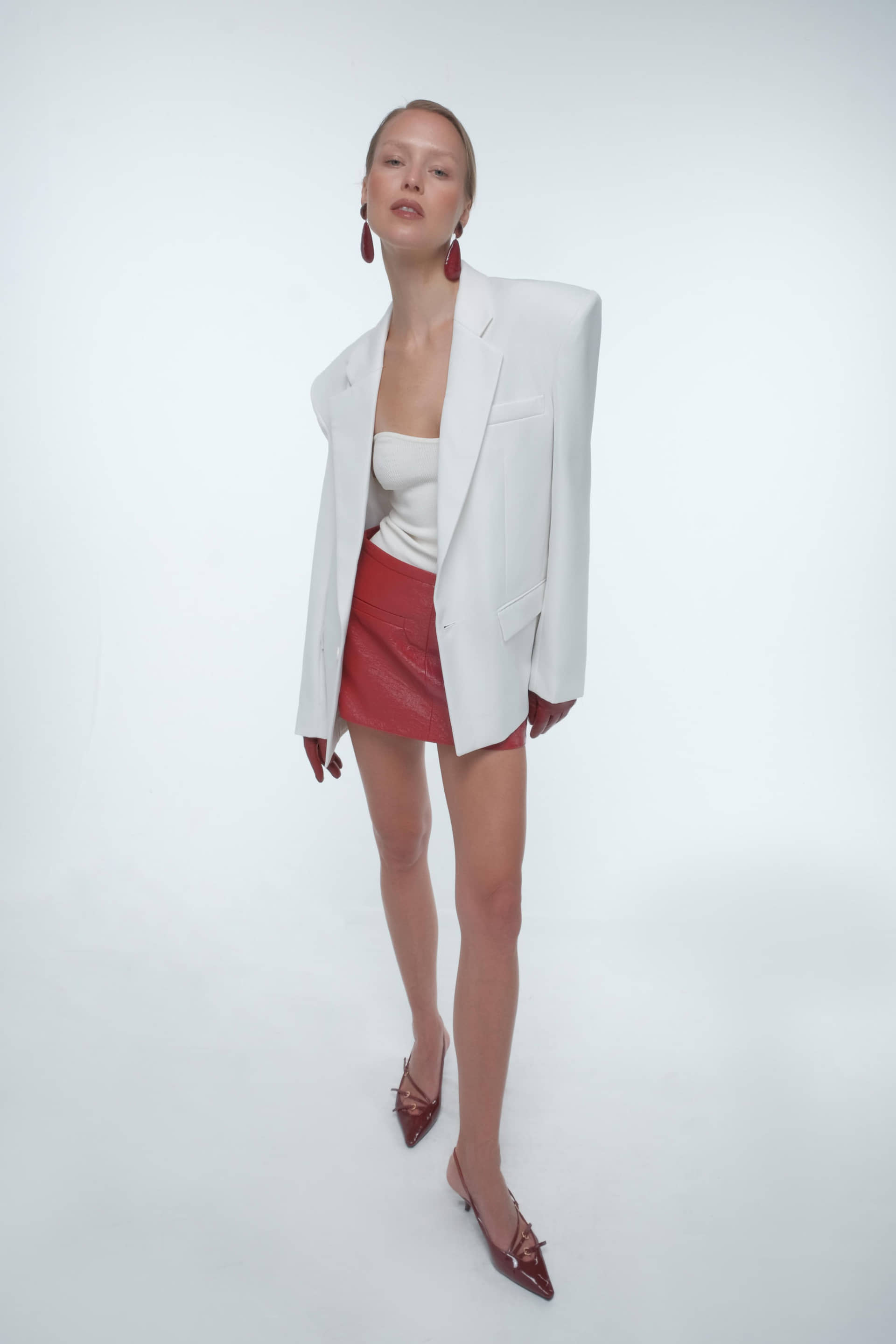 Oversized minimal blazer in White made by AFTERHOURS