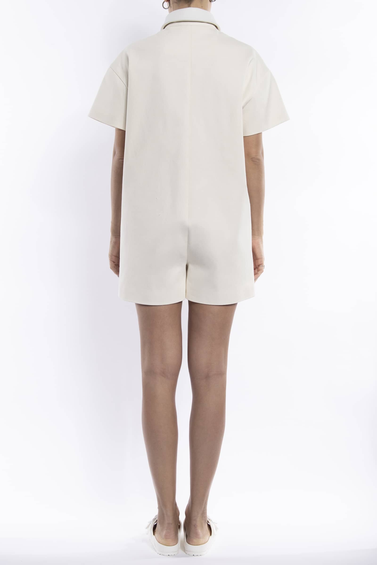 Miami Denim & Leather Jumpsuit in White made by Vestiaire d'un Oiseau Libre