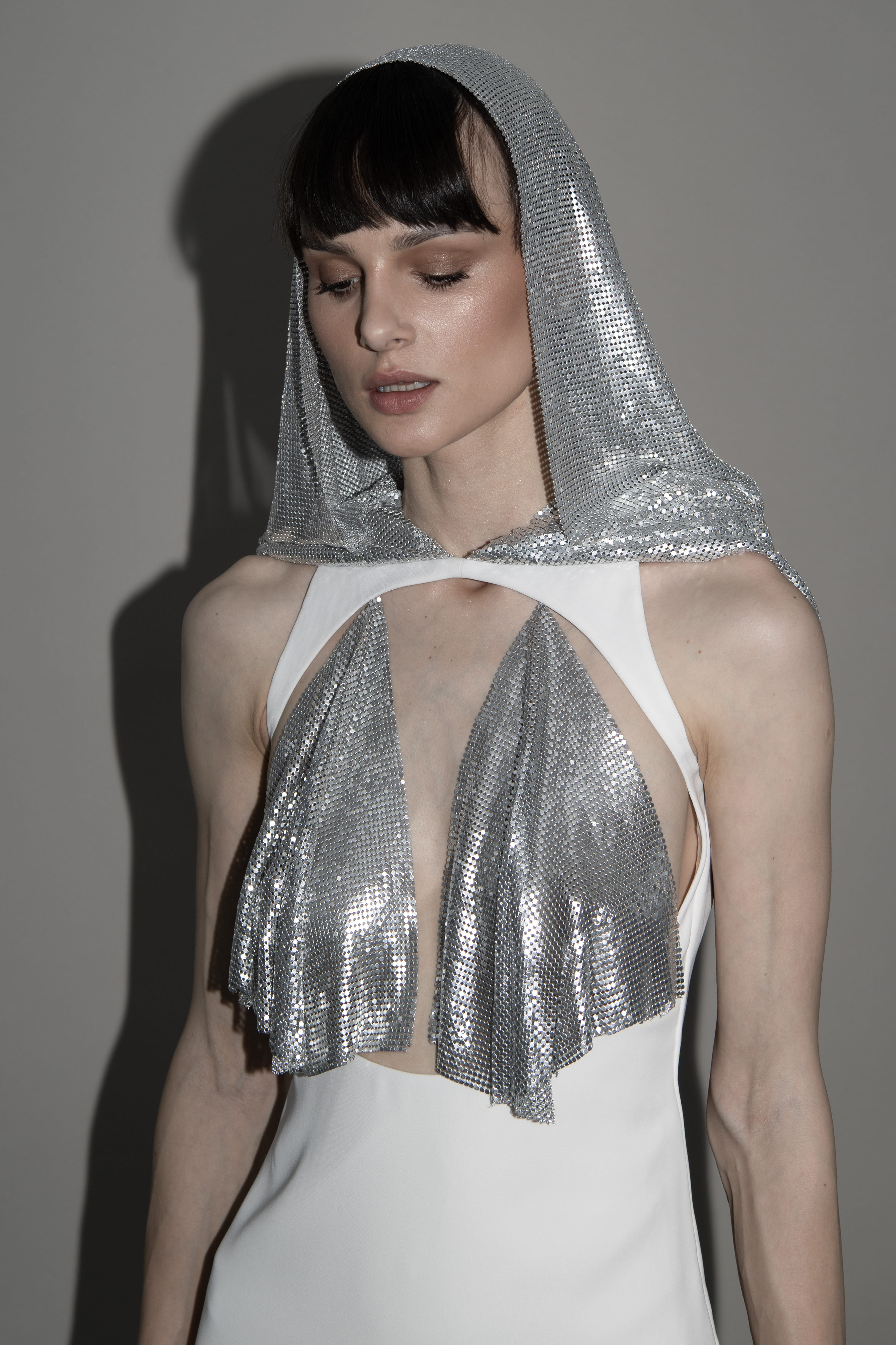 metallic hooded gown in White made by Vestiaire d'un Oiseau Libre