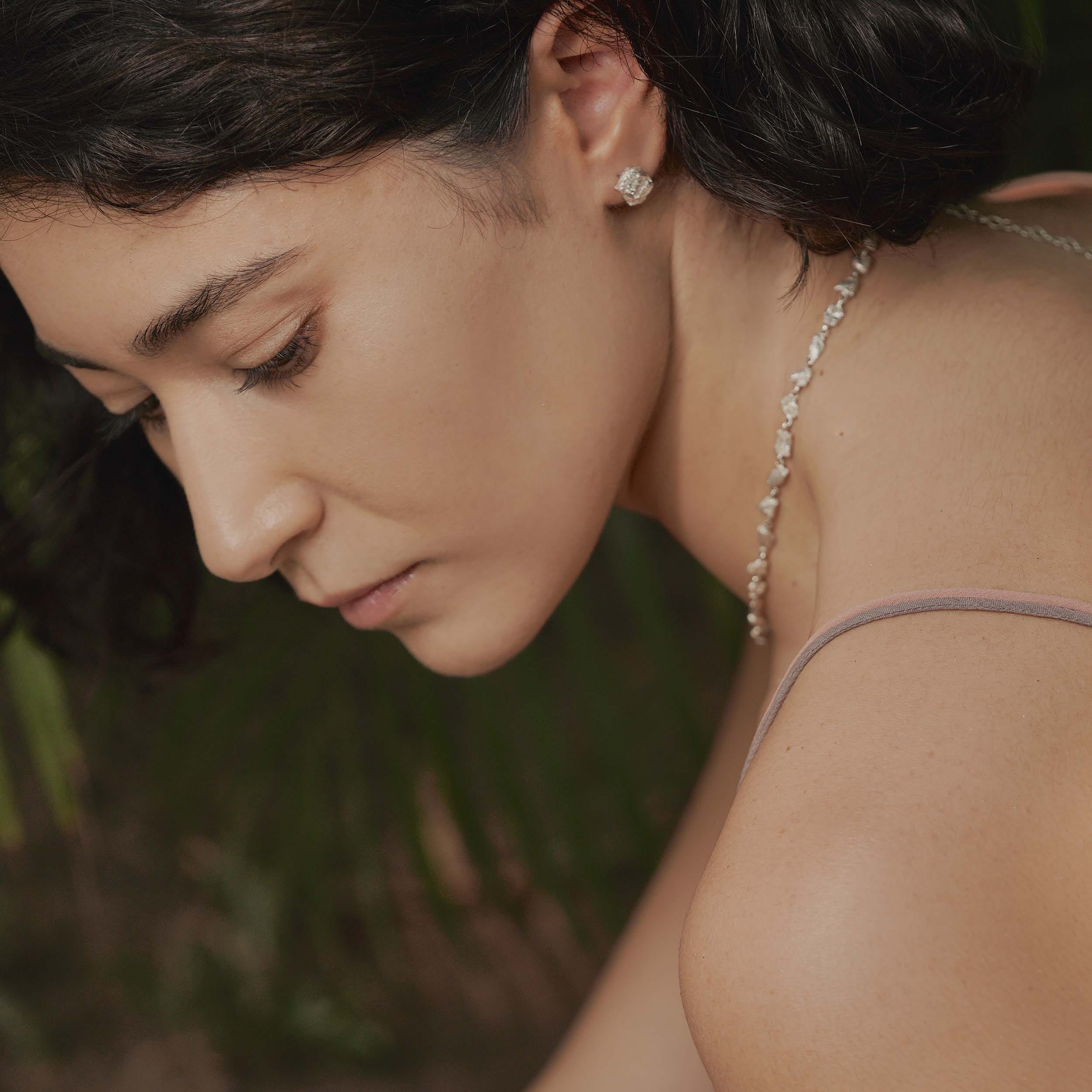 Deti White Sapphire Argenti Earrings made by Loveness Lee