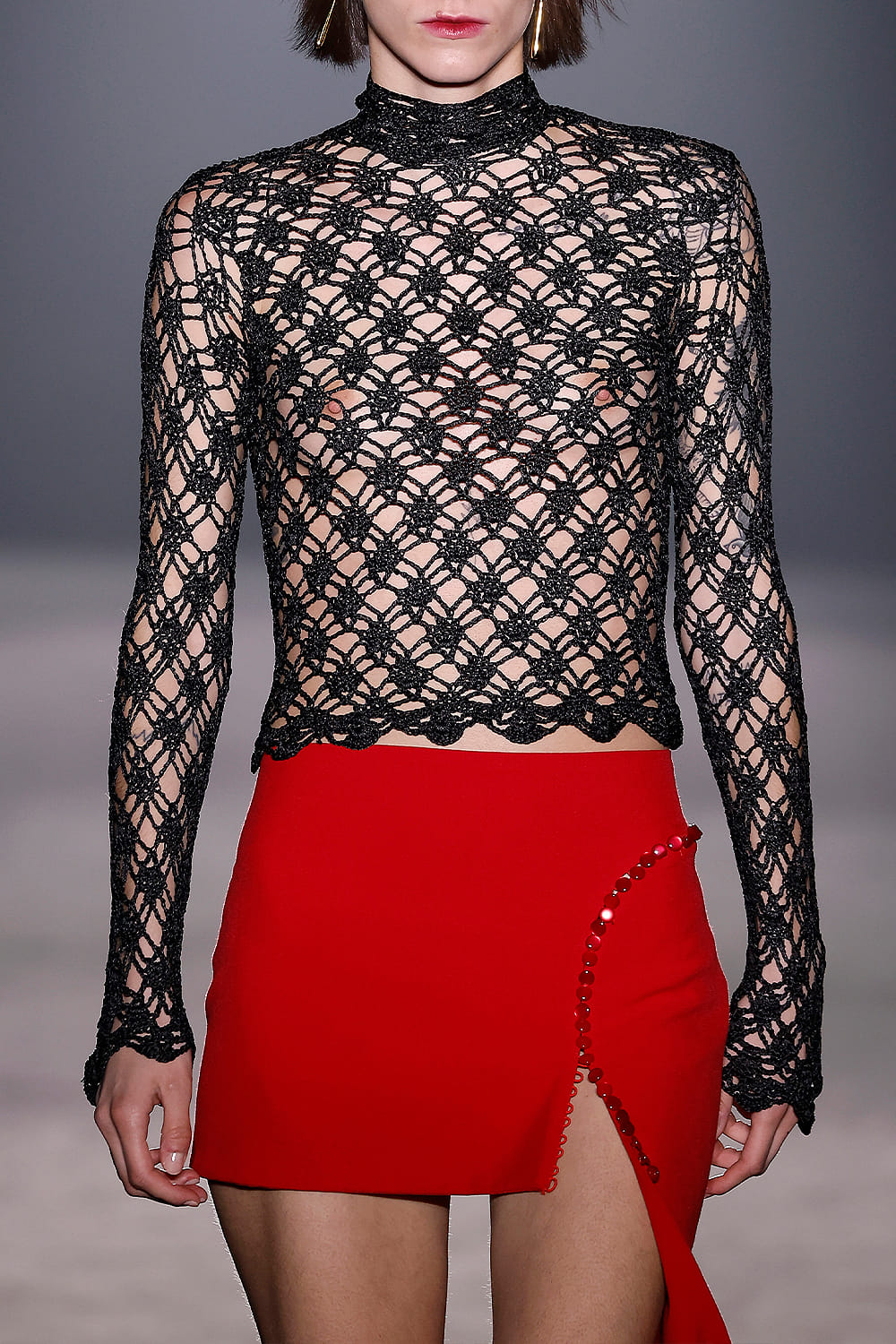 Red button mini skirt made by Compte Spain