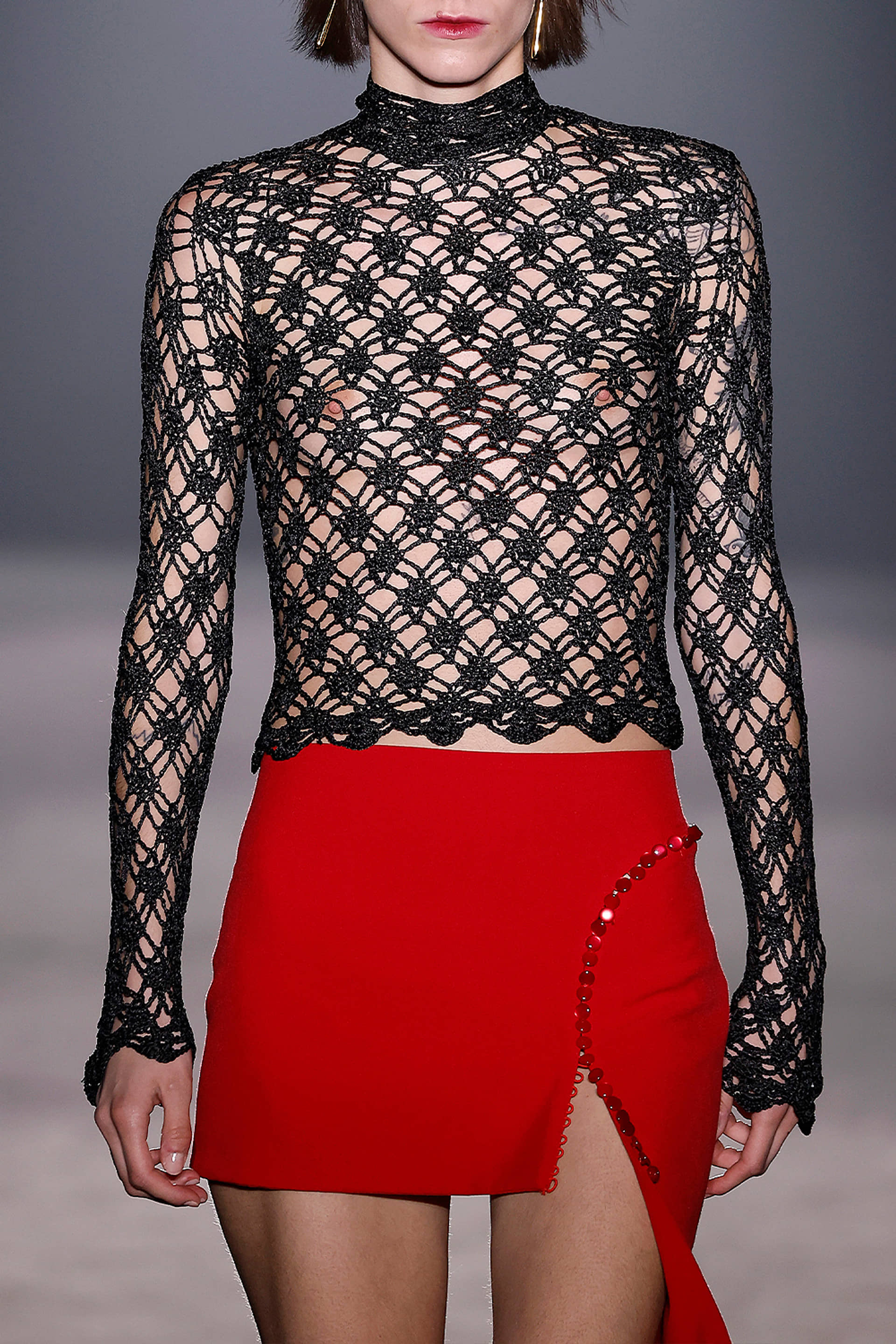 Red button mini skirt made by Compte Spain