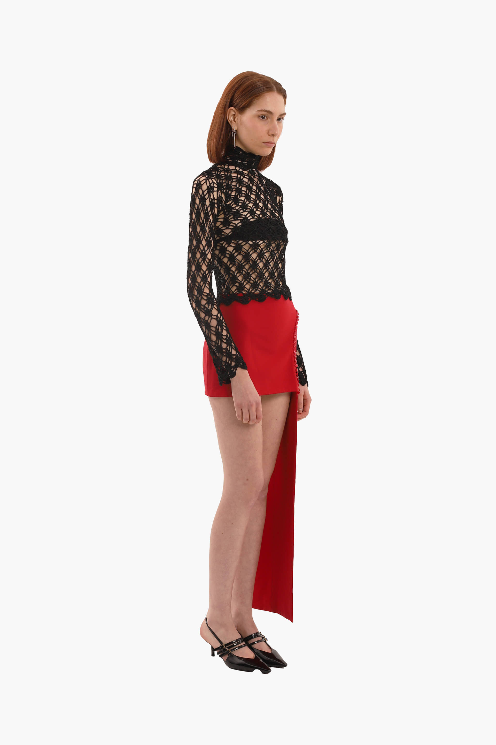 Red button mini skirt made by Compte Spain