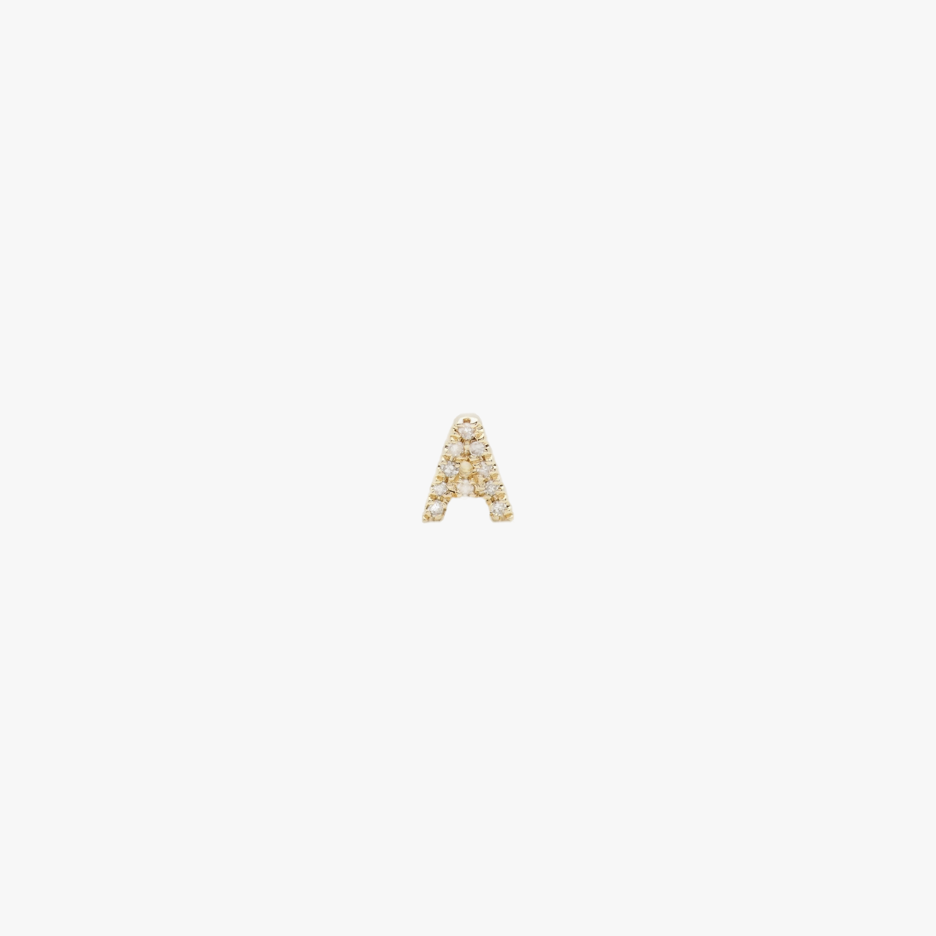 PETITE LETTER STUD - WHITE DIAMONDS & YELLOW GOLD made by ENNUI