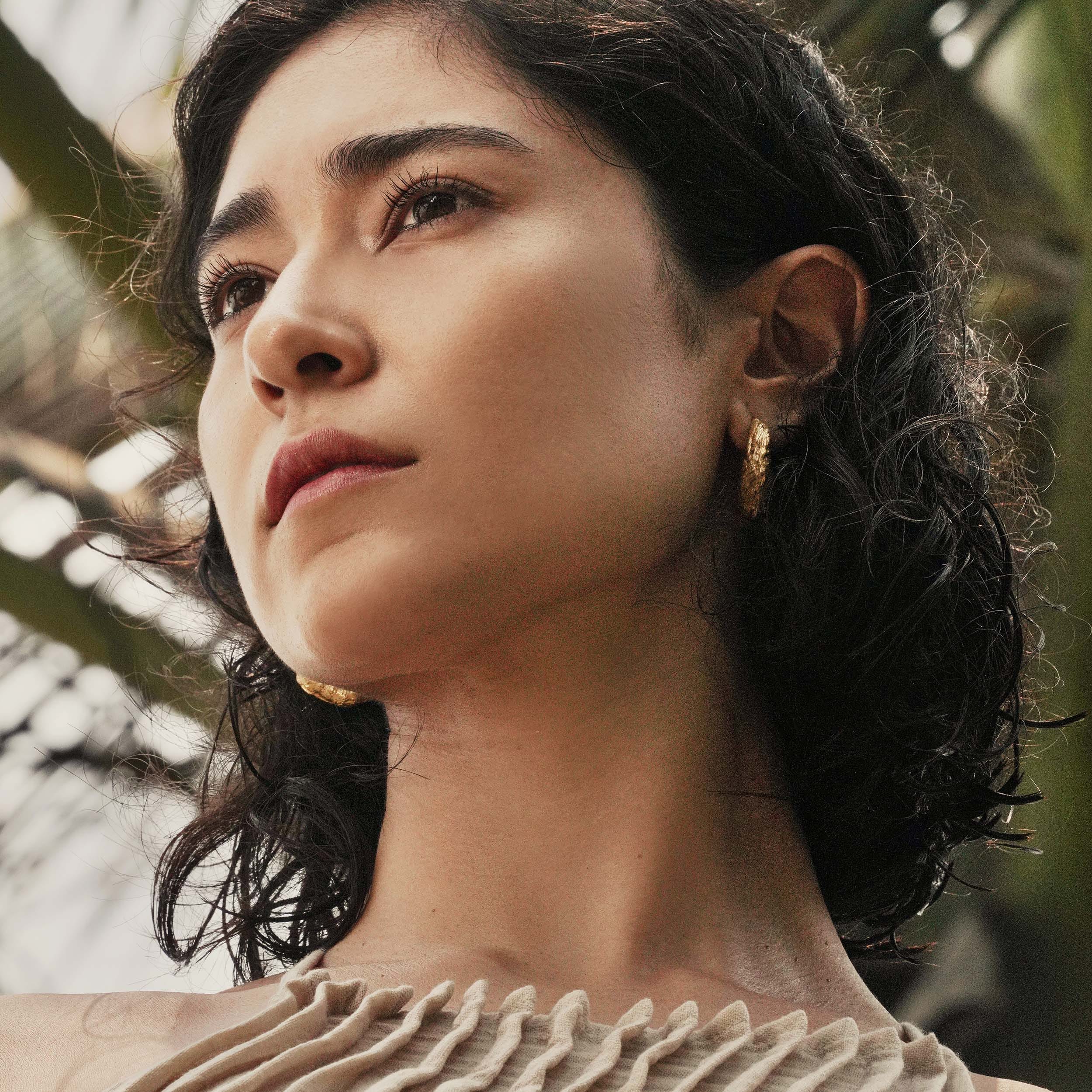 Poli White Sapphire Earrings made by Loveness Lee