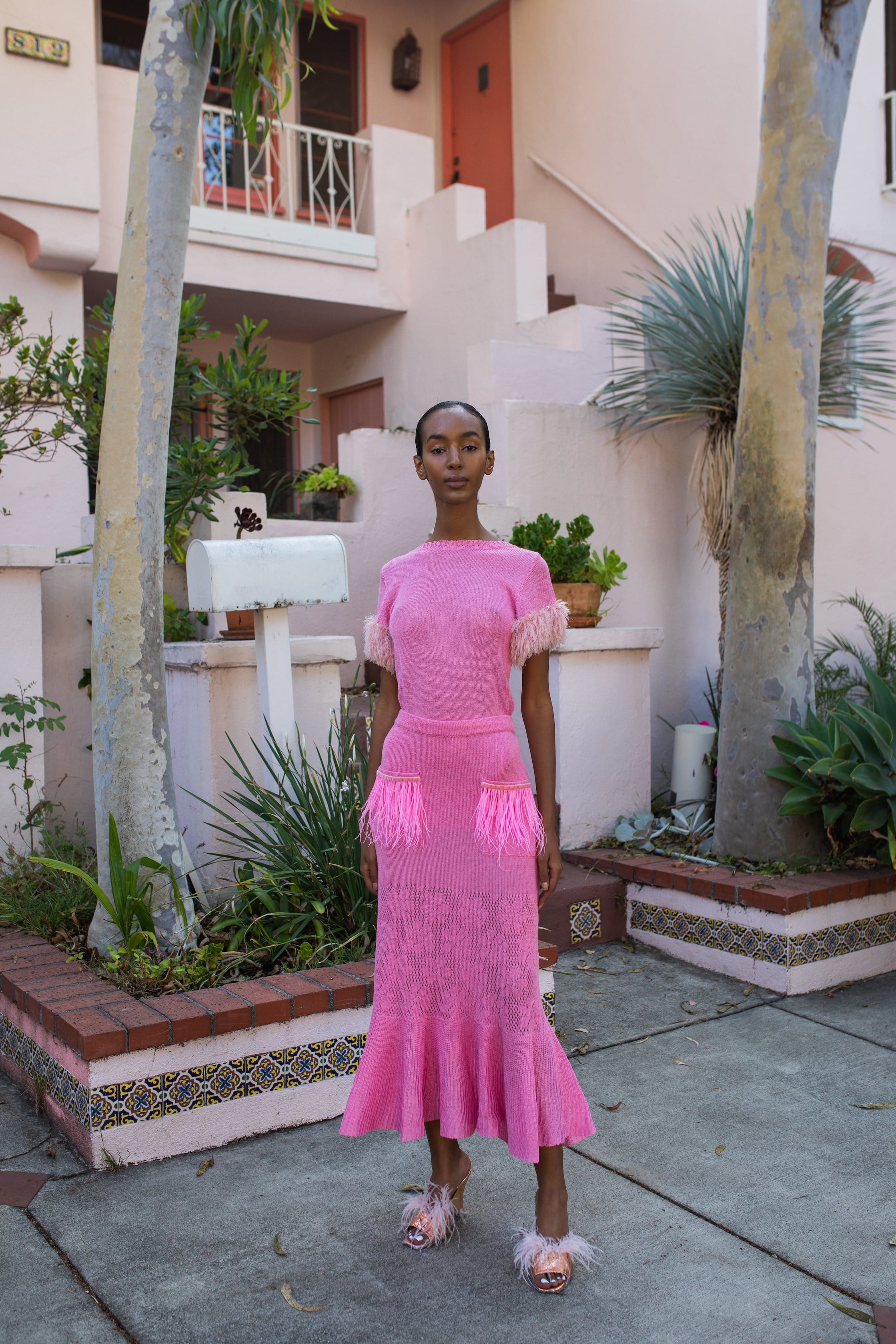 Pink Knit Skirt With Feather Details On the Pocket by made by ANDREEVA