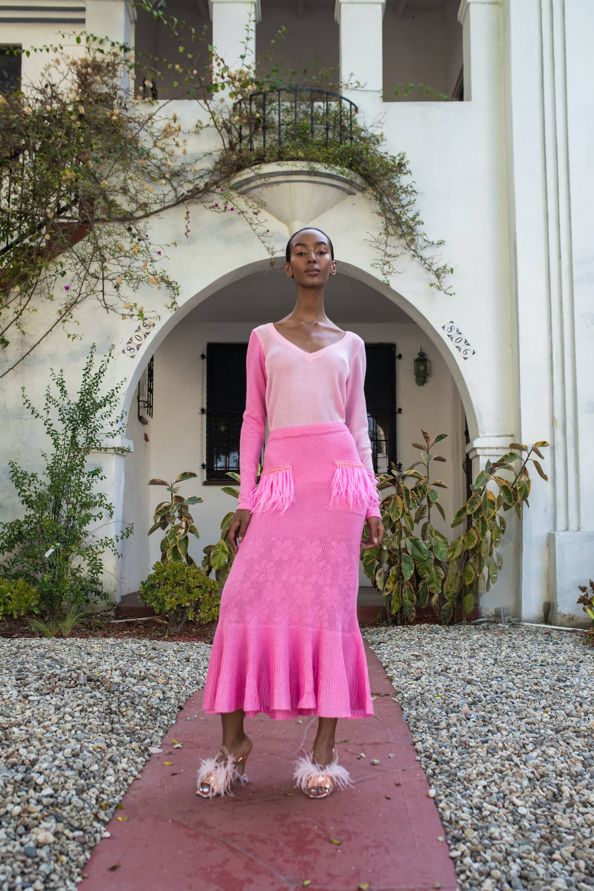 Pink Knit Skirt With Feather Details On the Pocket by made by ANDREEVA
