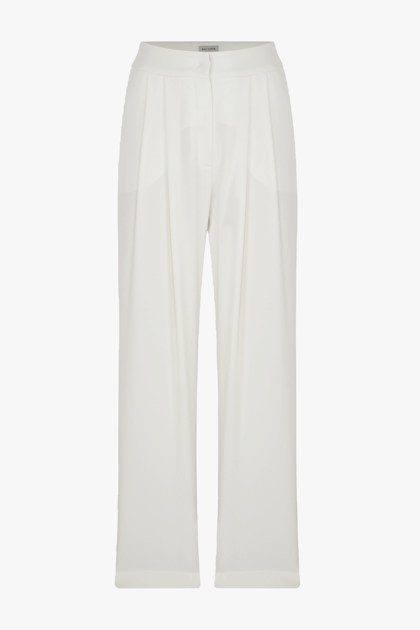 Tina Crepe Trousers in Blanche in White made by Nazli Ceren