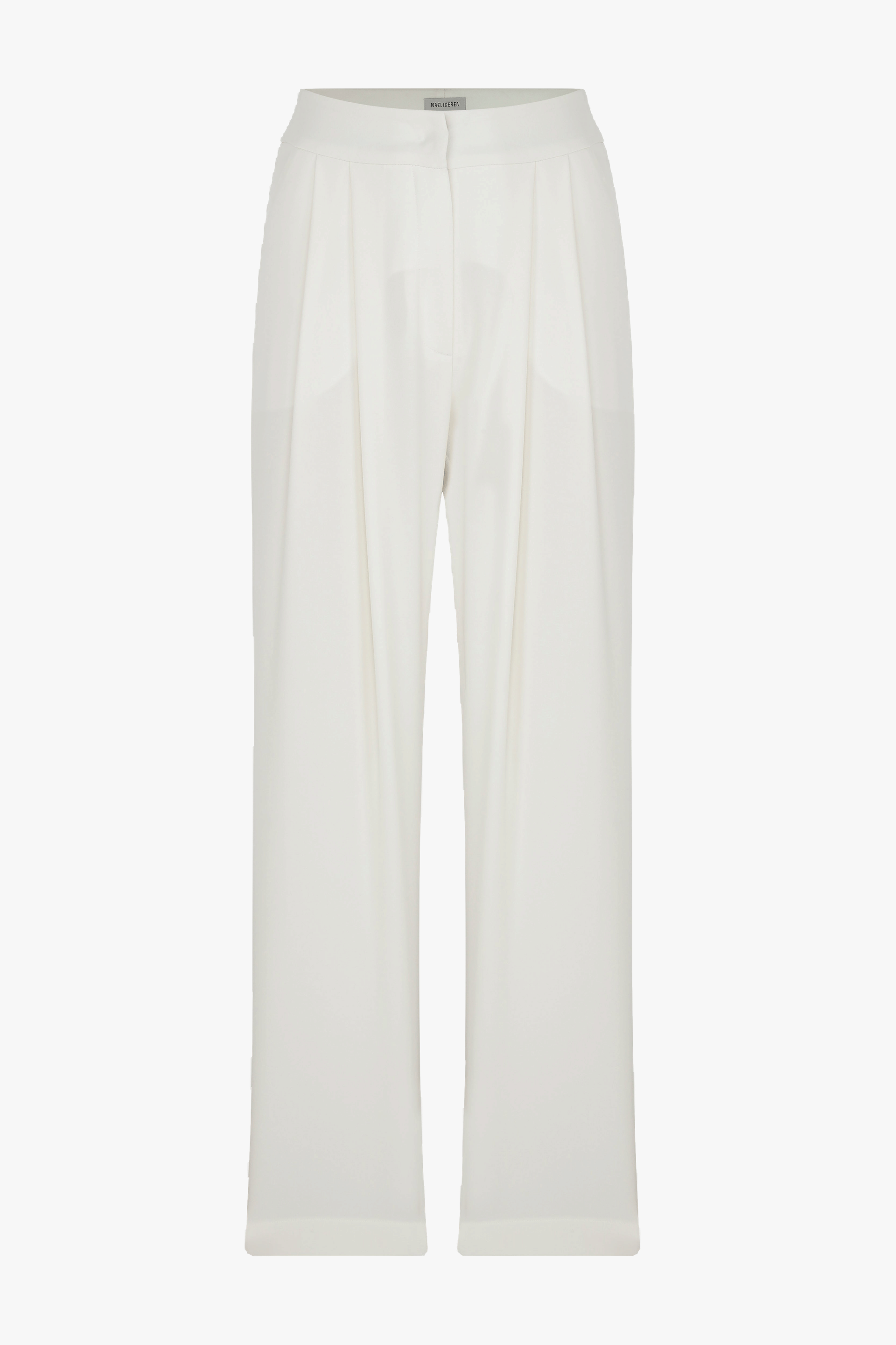 Tina Crepe Trousers in Blanche in White made by Nazli Ceren