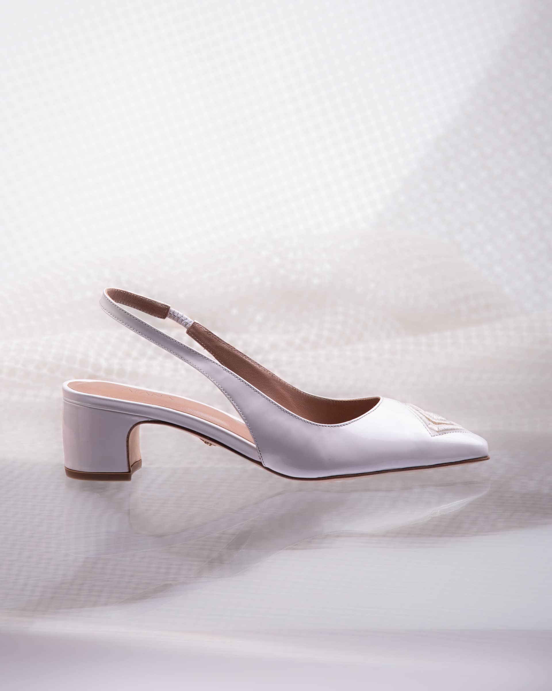 Diamond Slingback 45 White Patent in White made by ATANA
