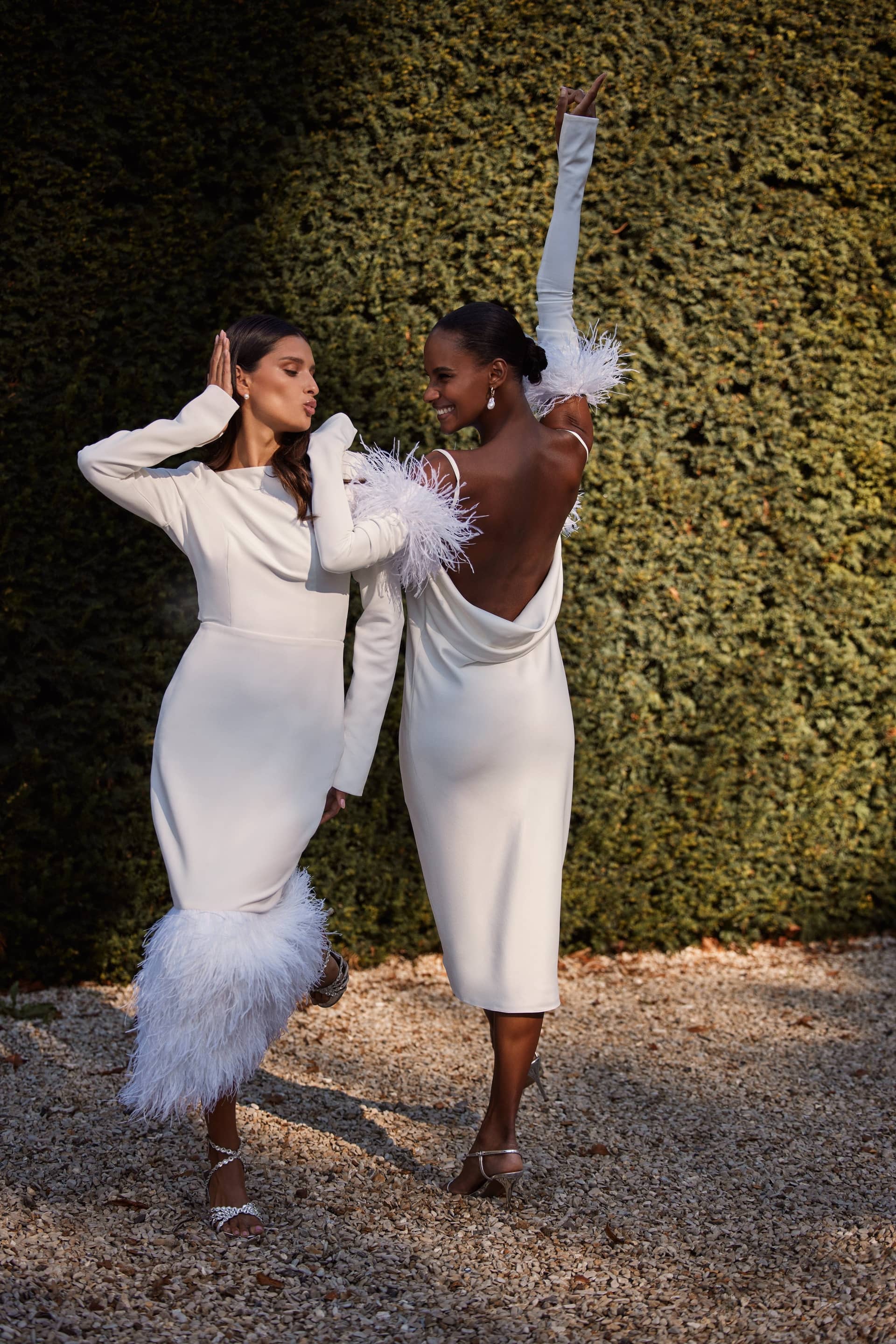 Voguish feather embellished midi dress made by Milla