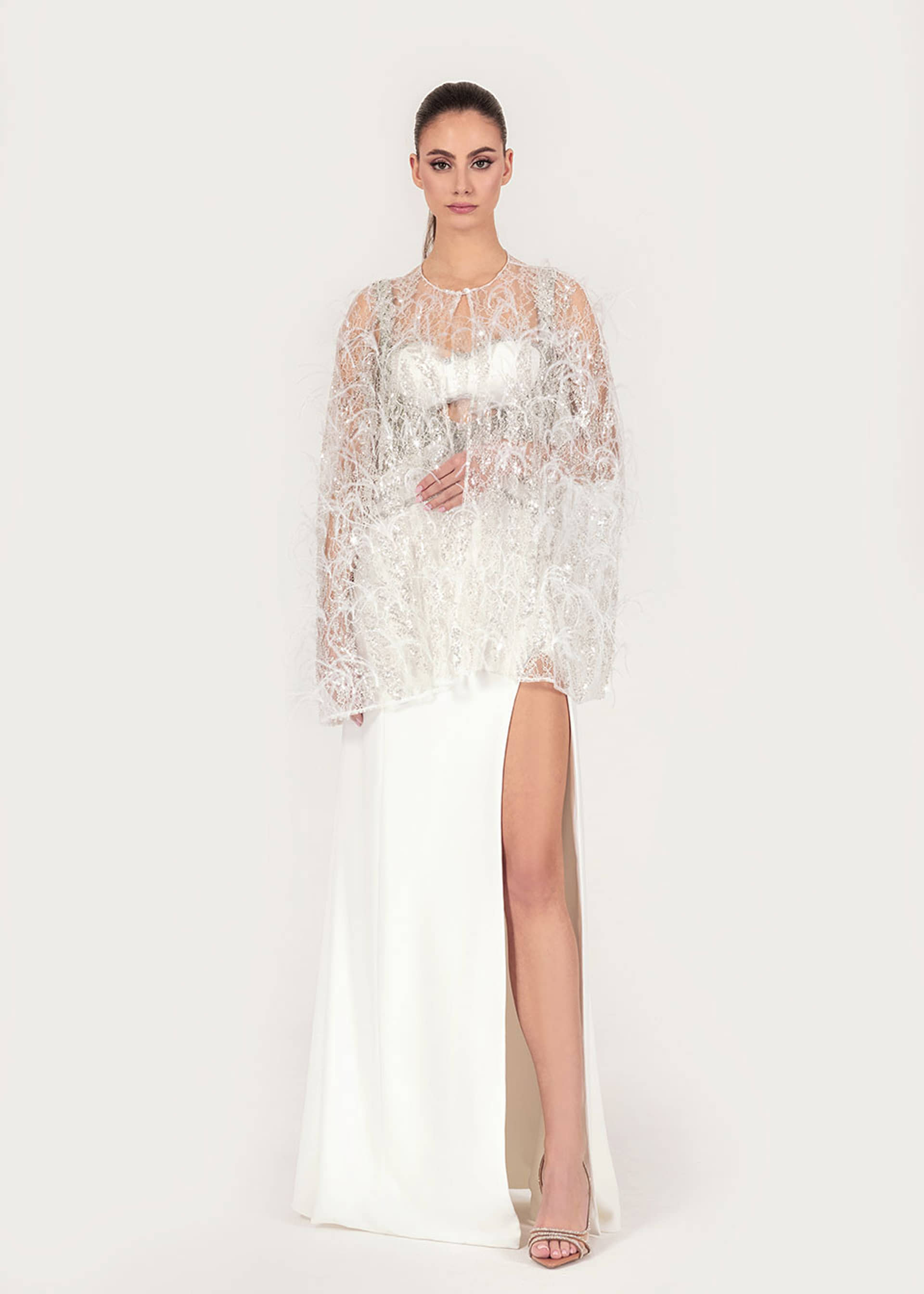 Embroidered feather cape made by Monika Dimova