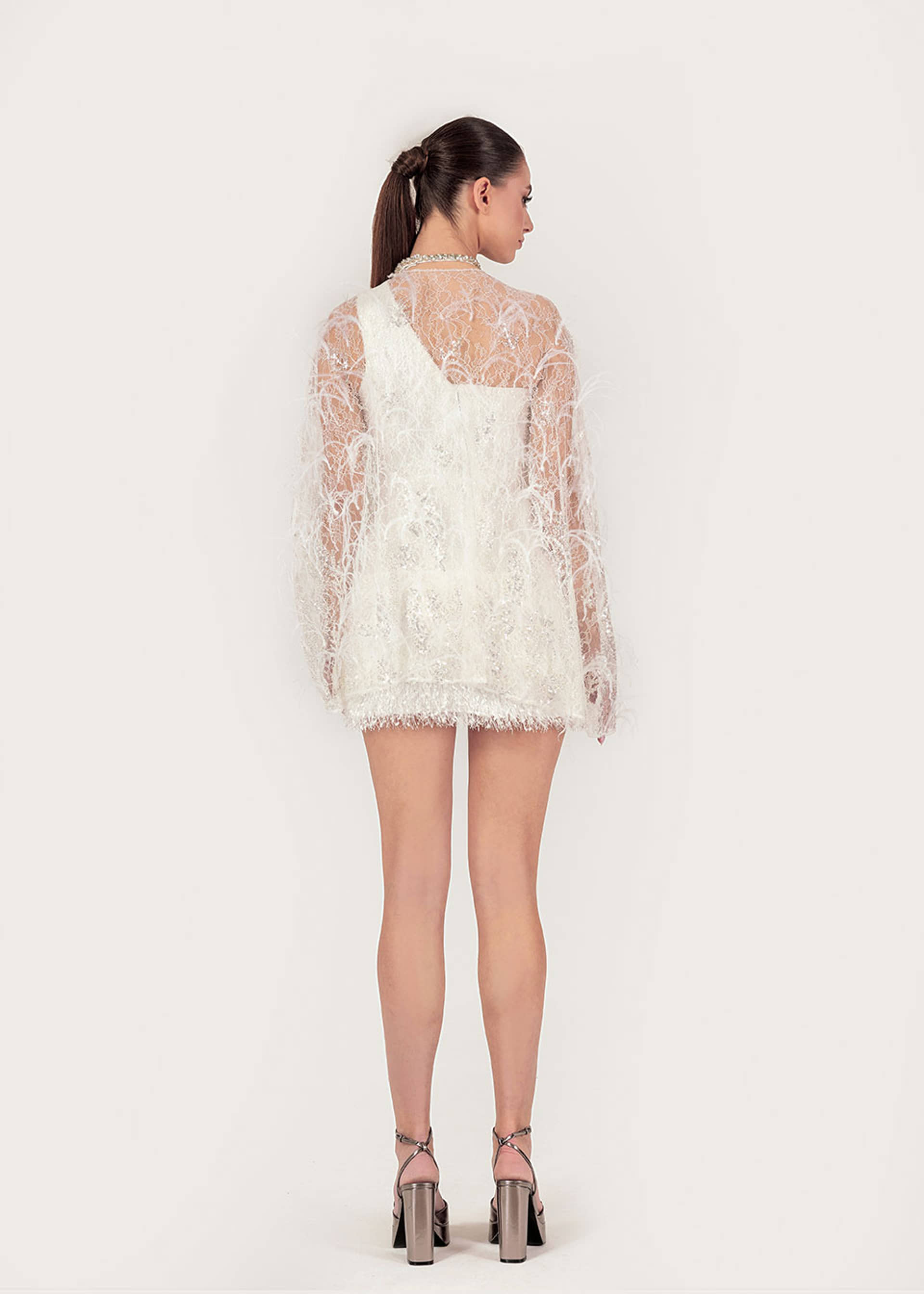 Embroidered feather cape made by Monika Dimova