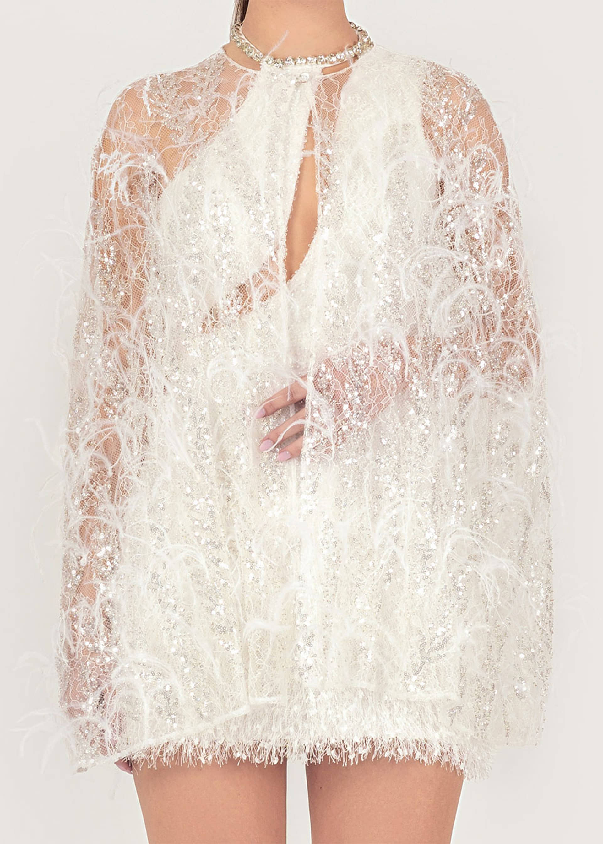 Embroidered feather cape made by Monika Dimova