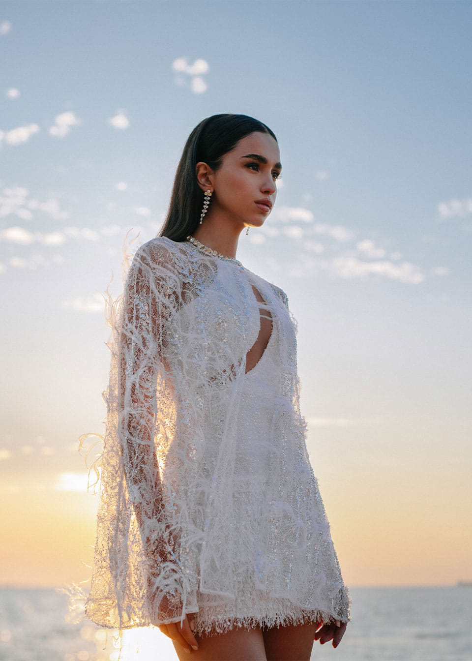 Embroidered feather cape made by Monika Dimova