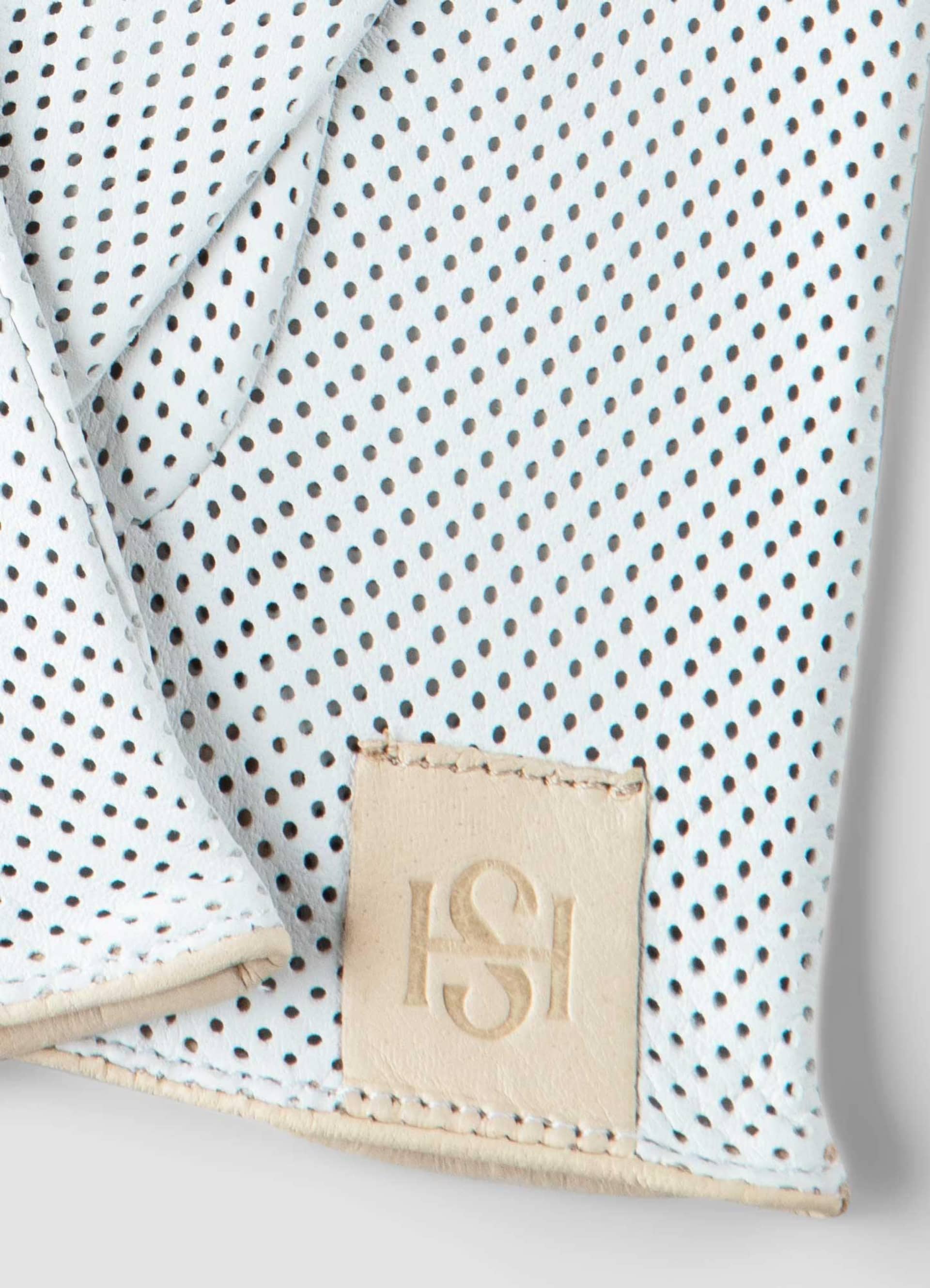 Statement Perforated White made by Handsome Stockholm