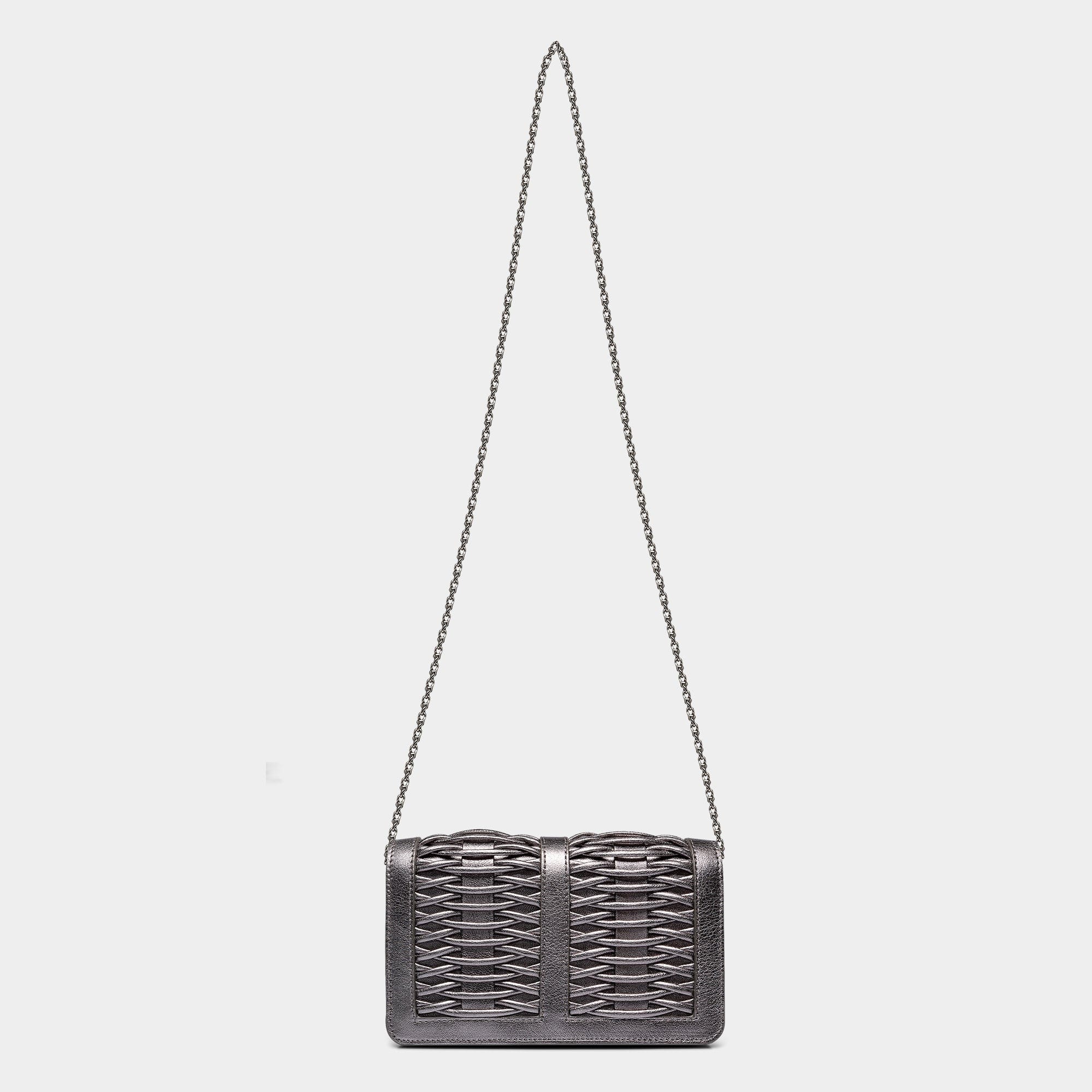 Lea pewter metallic braided clutch made by Yliana Yepez