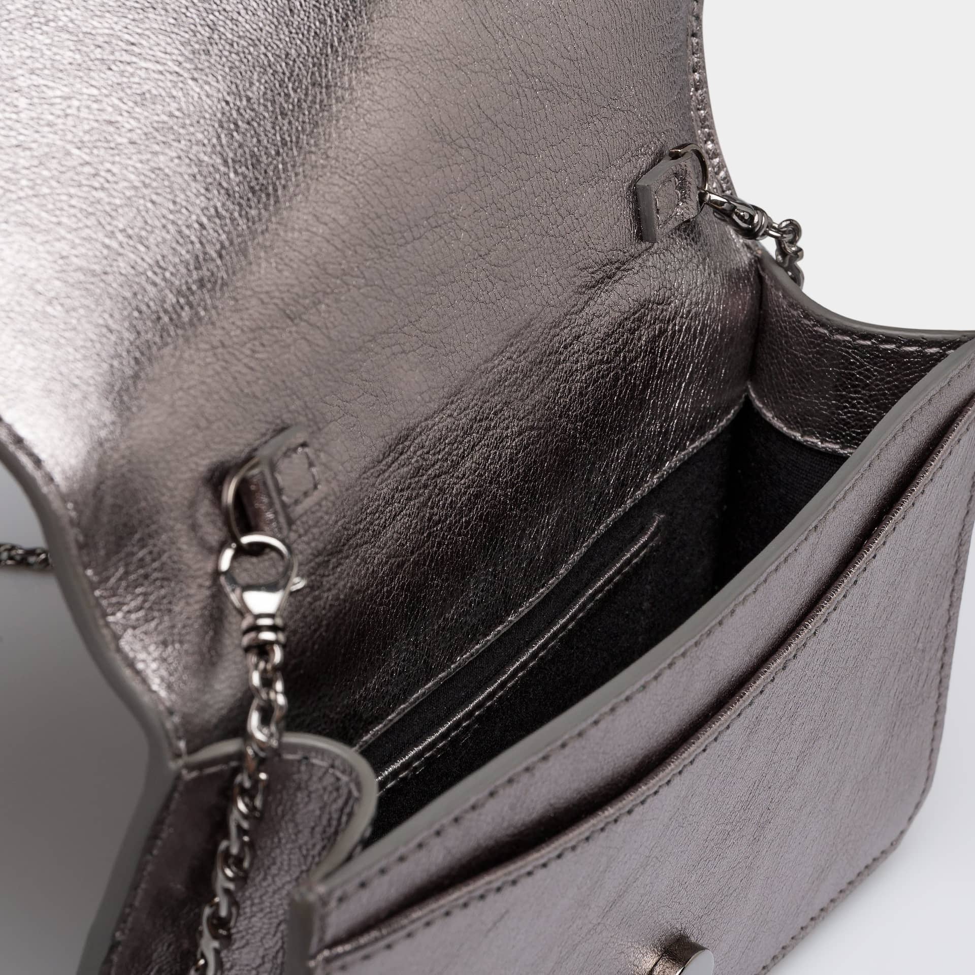 Lea pewter metallic braided clutch made by Yliana Yepez