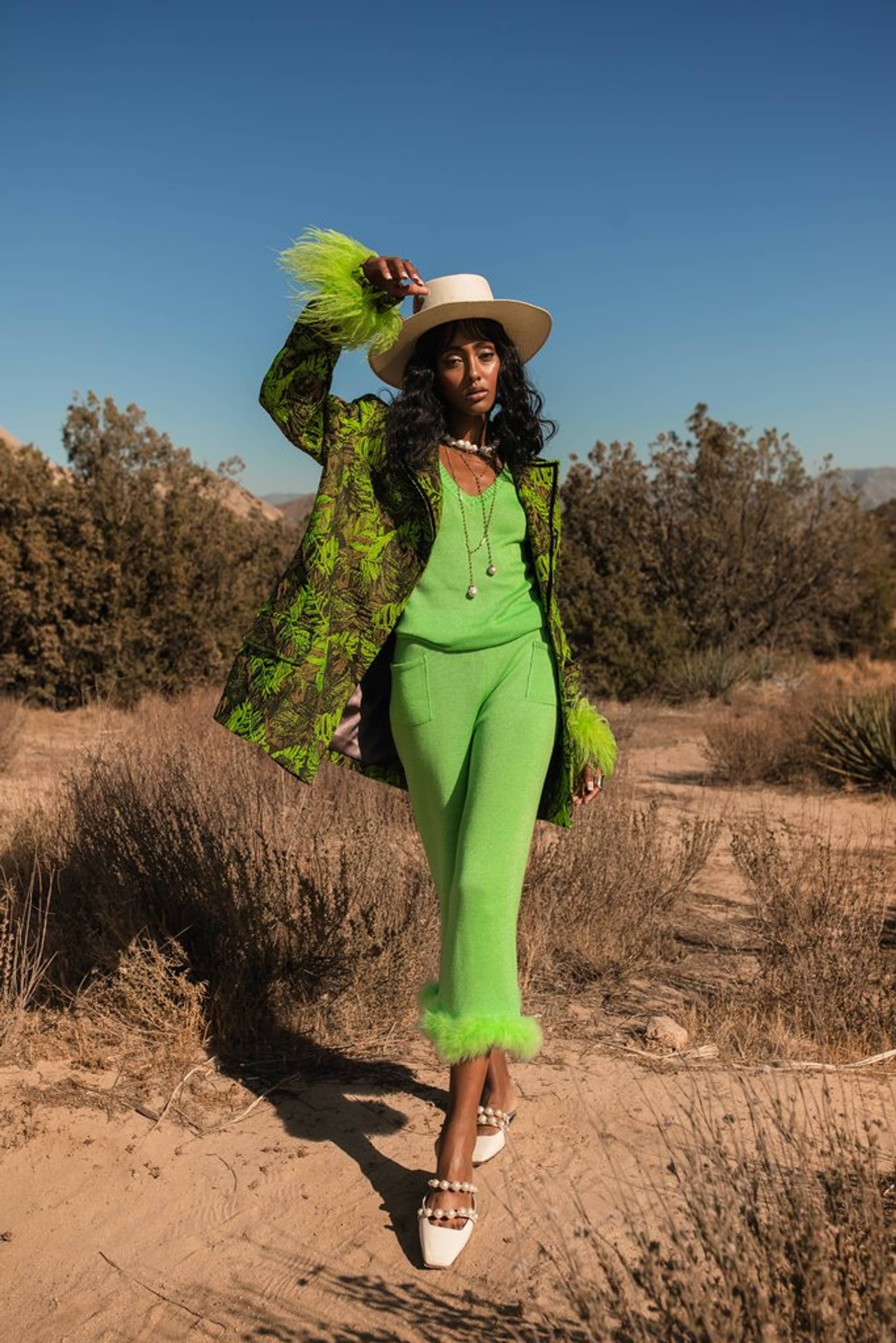 Mint knit pants with feather details made by ANDREEVA