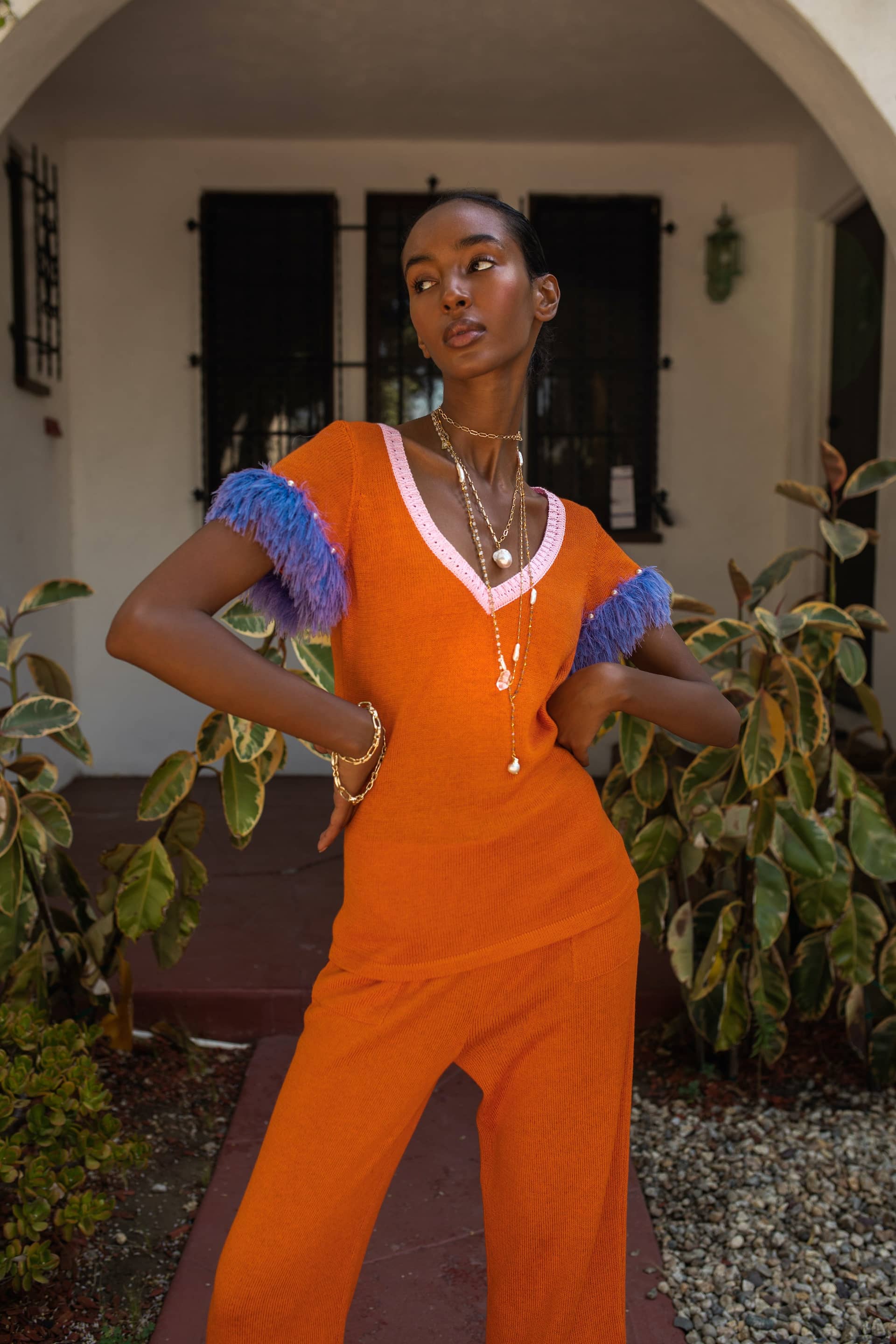 Golden poppy knit top with handmade knit details and pearls made by ANDREEVA