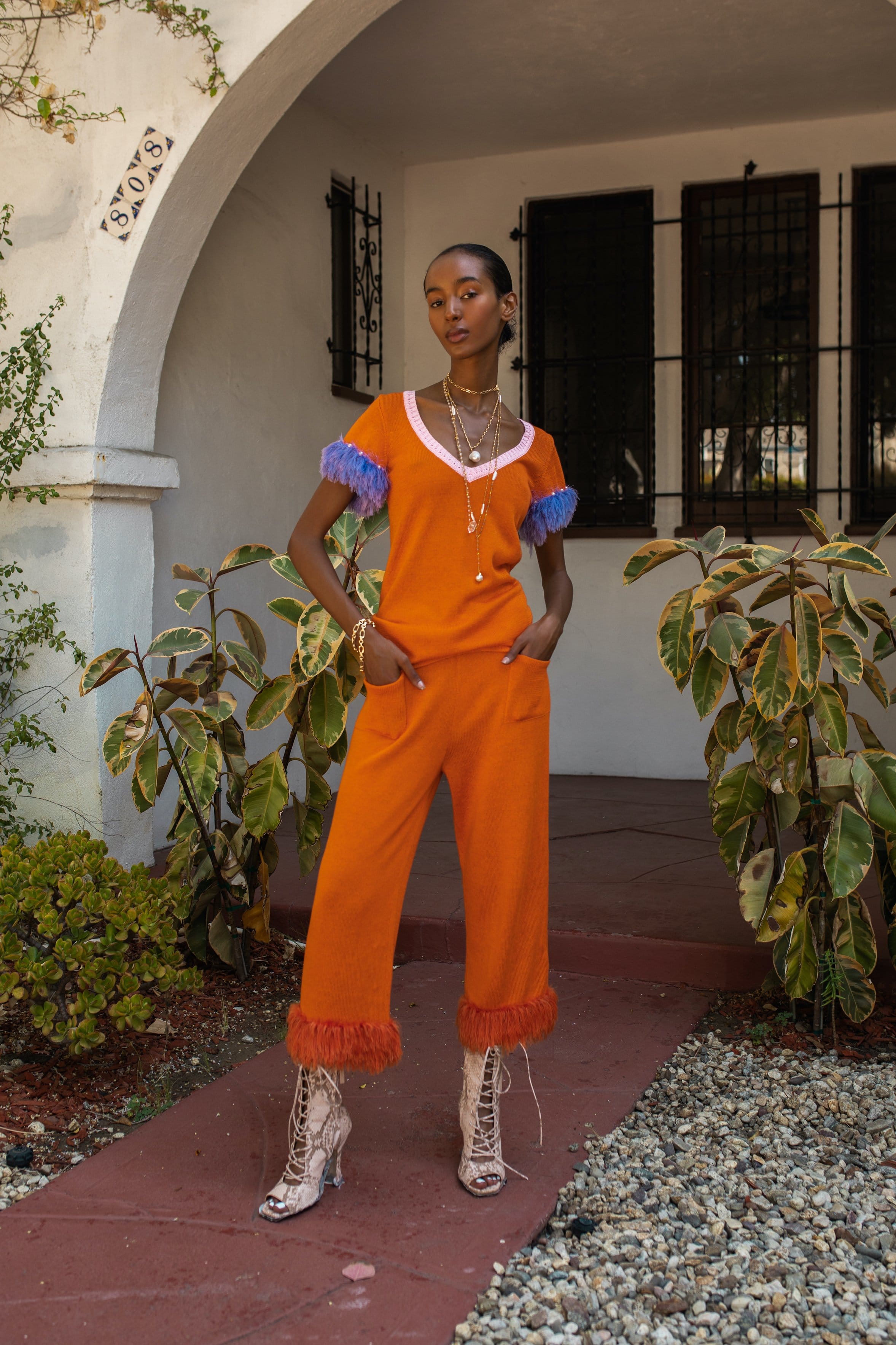 Golden poppy knit top with handmade knit details and pearls made by ANDREEVA