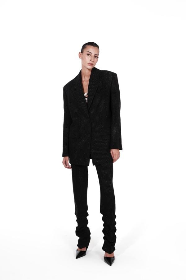 PINSTRIPED TROUSERS made by NUÉ