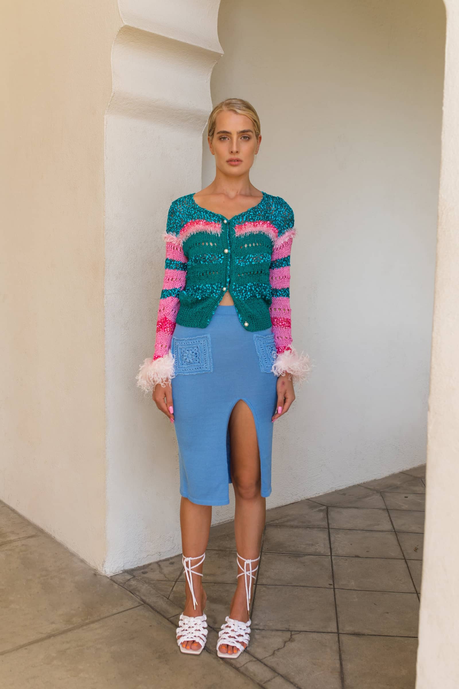 Blue knit skirt with crochet pockets made by ANDREEVA