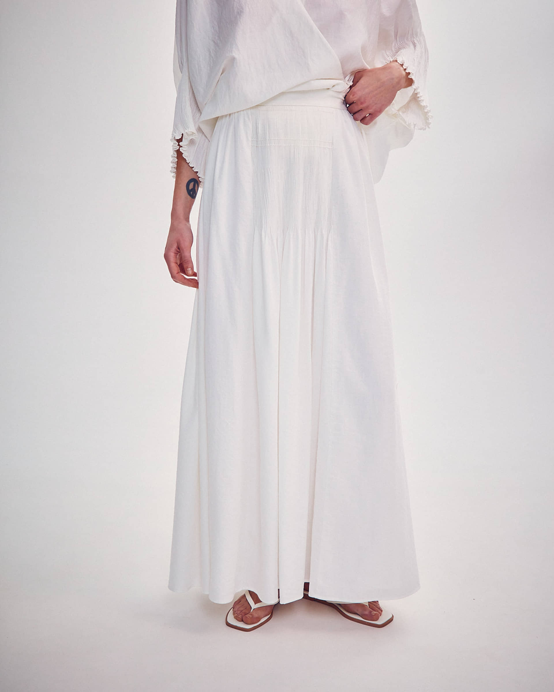 SKIRT WITH HAND-EMBROIDERED TIE made by DELEGAN Clothes