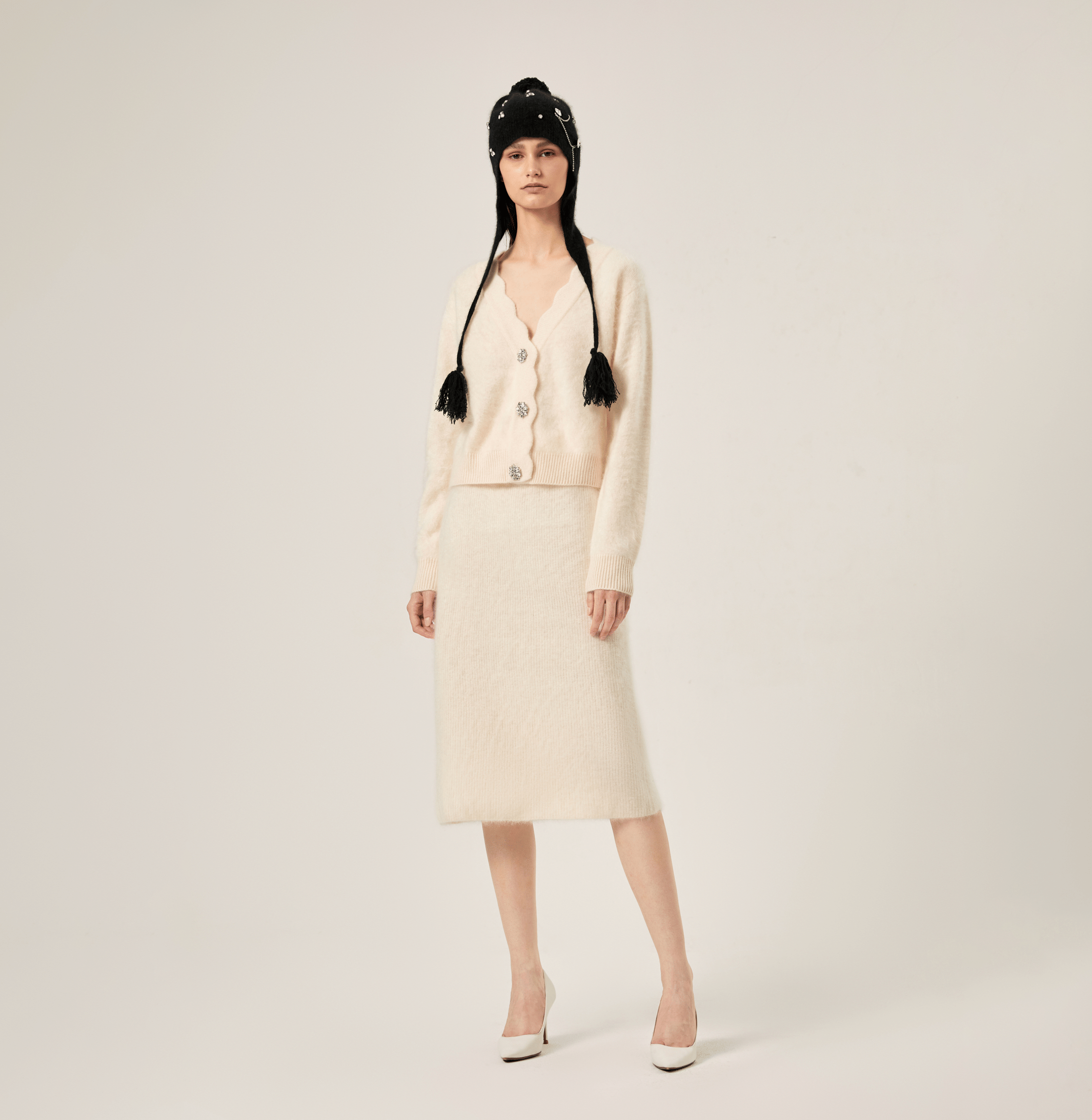 FLUFFY CASHMERE SCALLOPED V-NECK CARDIGAN in White made by CRUSH Collection