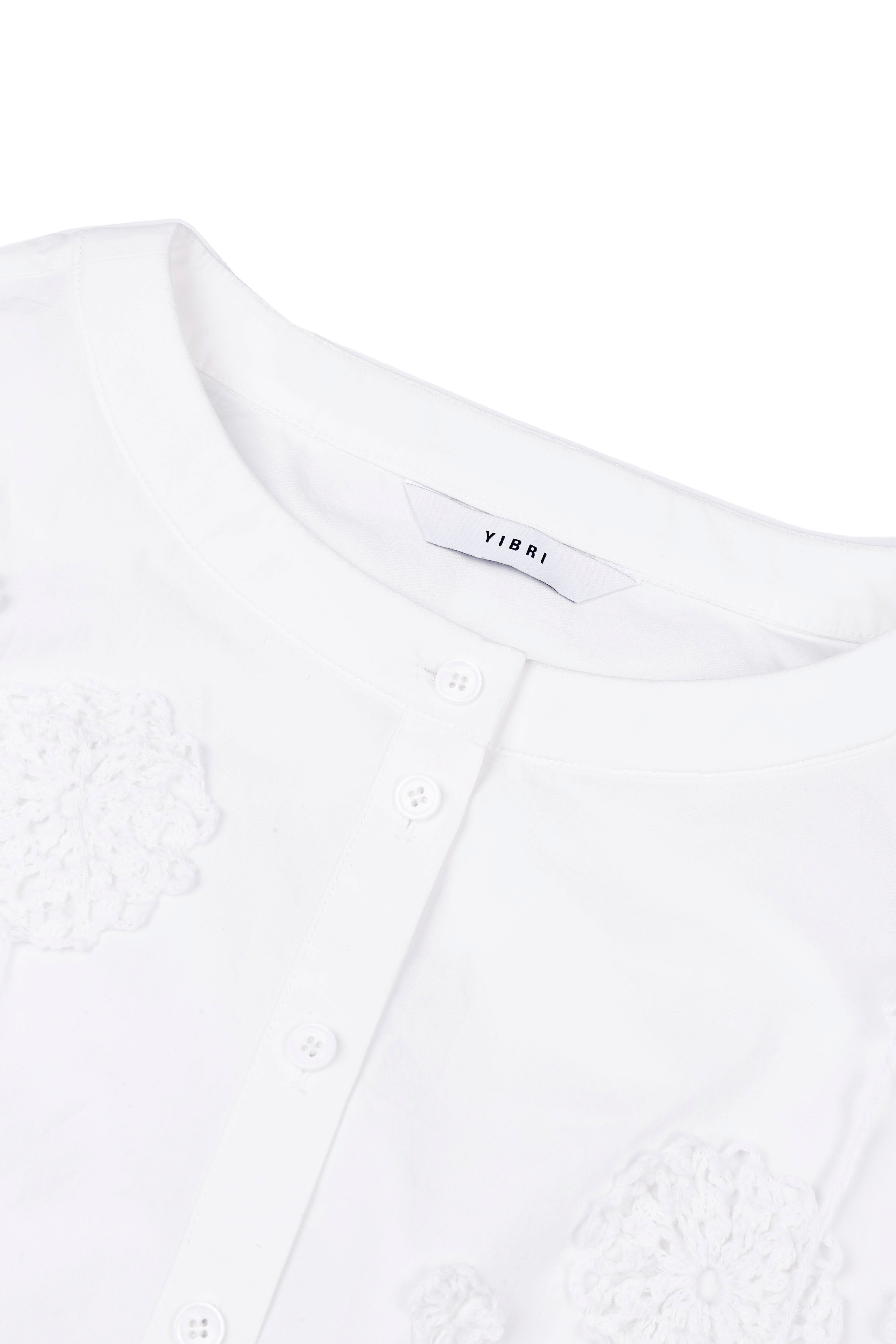 CROPPED WHITE BLOUSE WITH CROCHET FLOWER AND SMOCKED BELL SLEEVES made by YIBRI